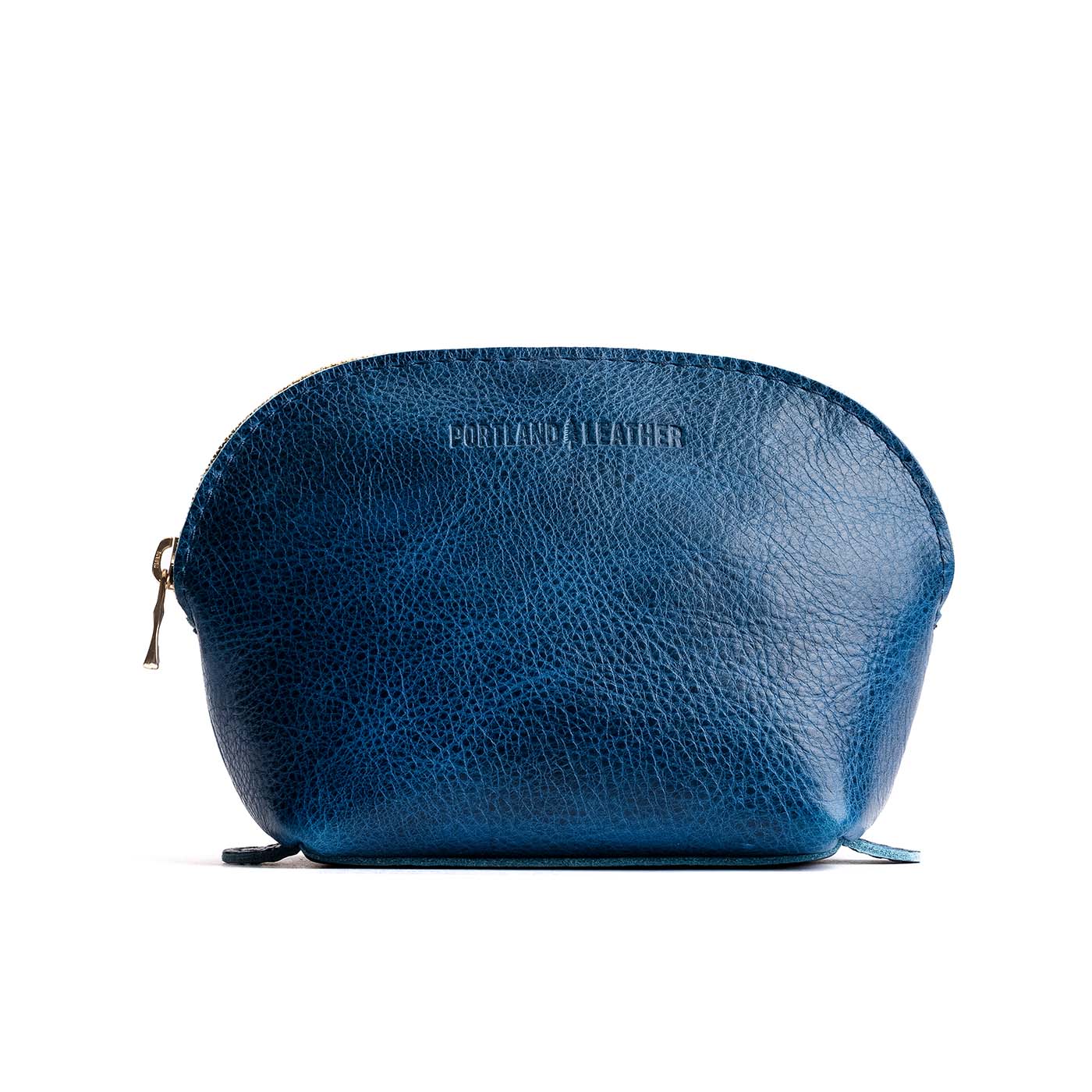 Caspian*Bella | Leather makeup bag with curved top zipper and flat bottom