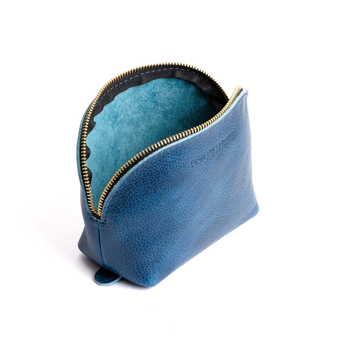 Caspian*Bella | Leather makeup bag with curved top zipper and flat bottom