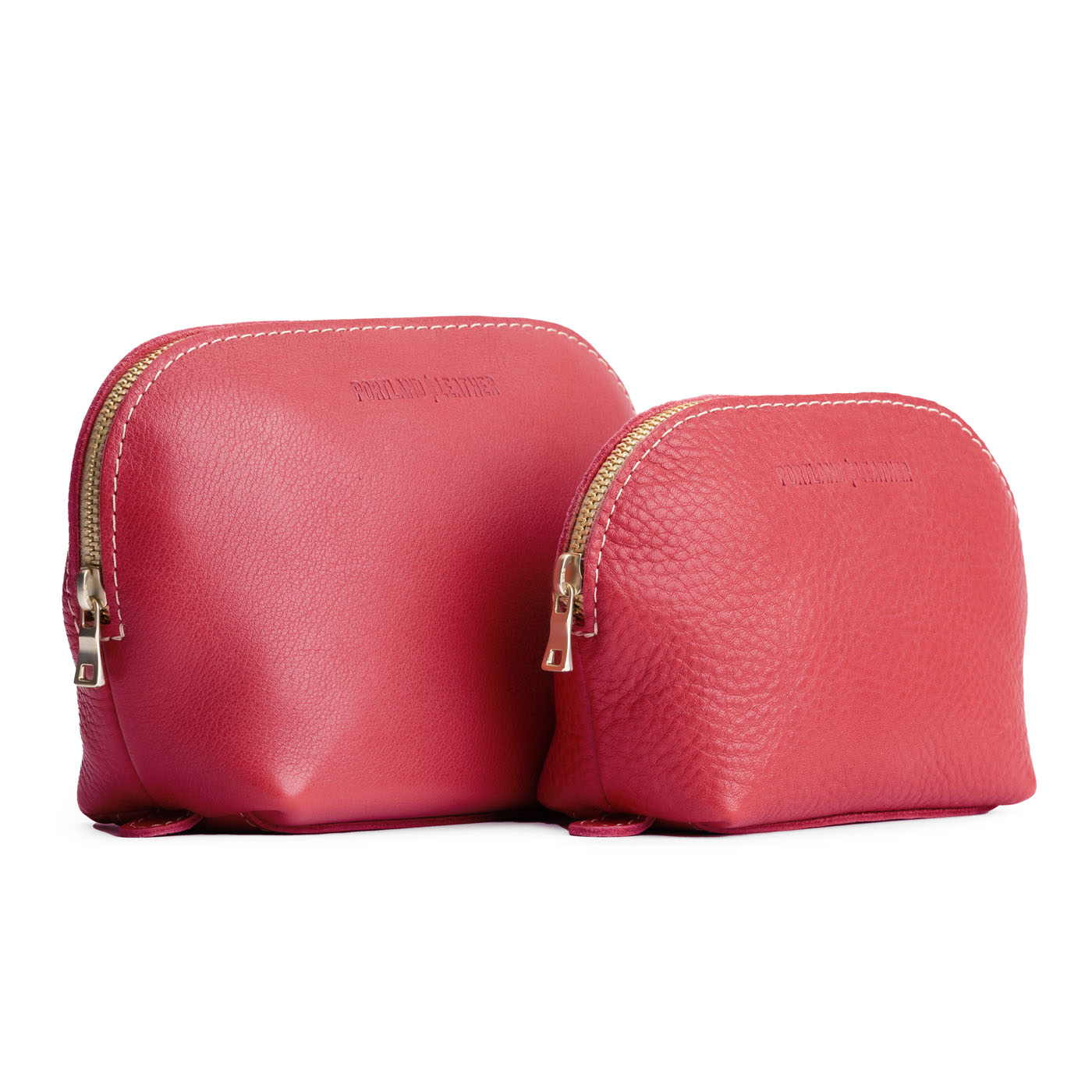 Sugar | Leather makeup bag with curved top zipper and flat bottom