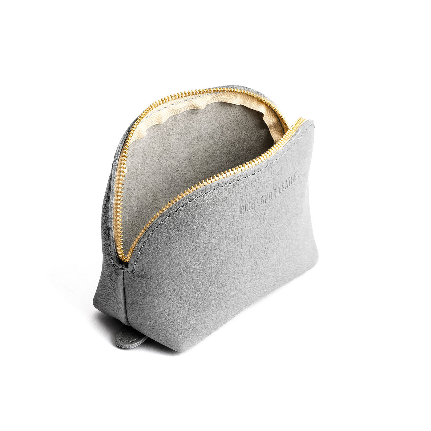 Nimbus*Bella | Leather makeup bag with curved top zipper and flat 