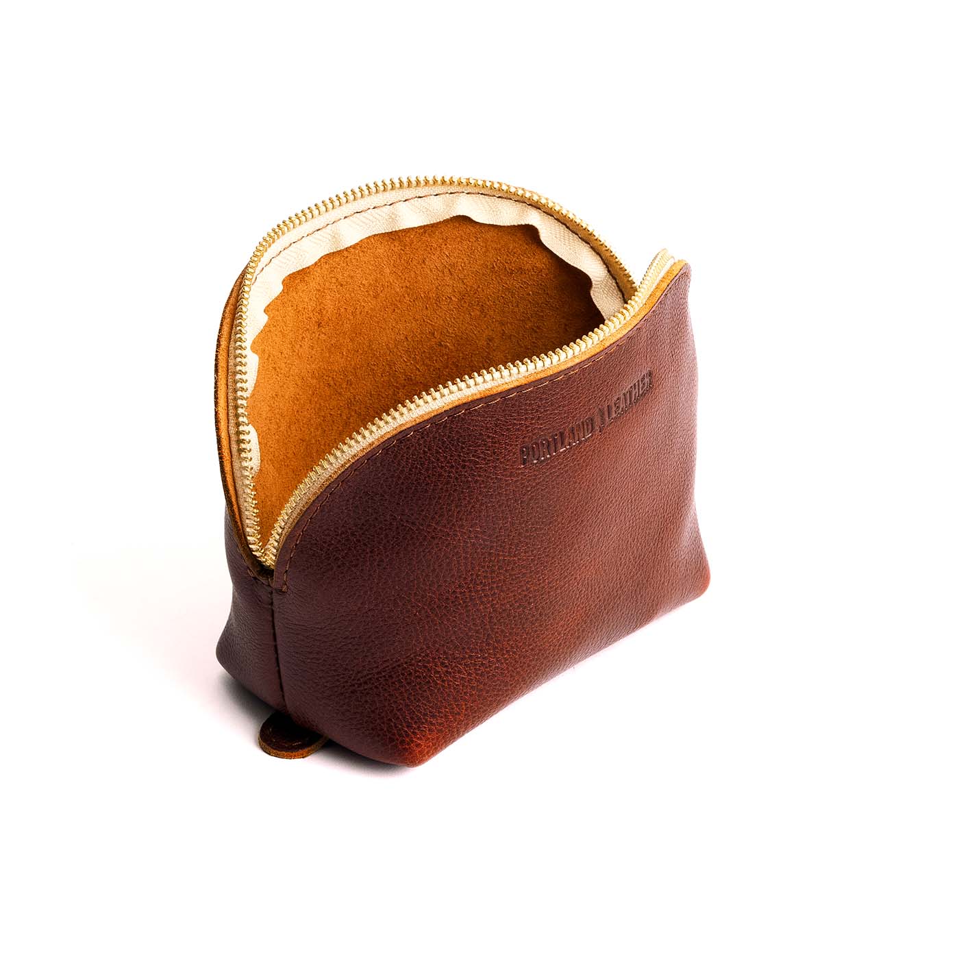 Nutmeg*Bella | Leather makeup bag with curved top zipper and flat 