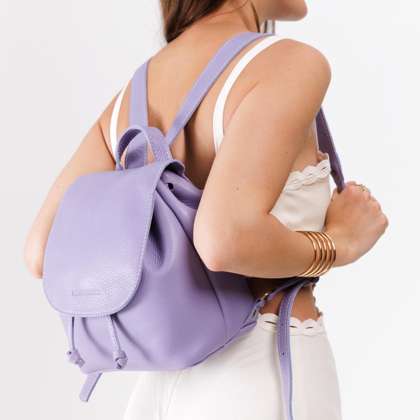 Wisteria | Model wearing slouchy leather bucket backpack