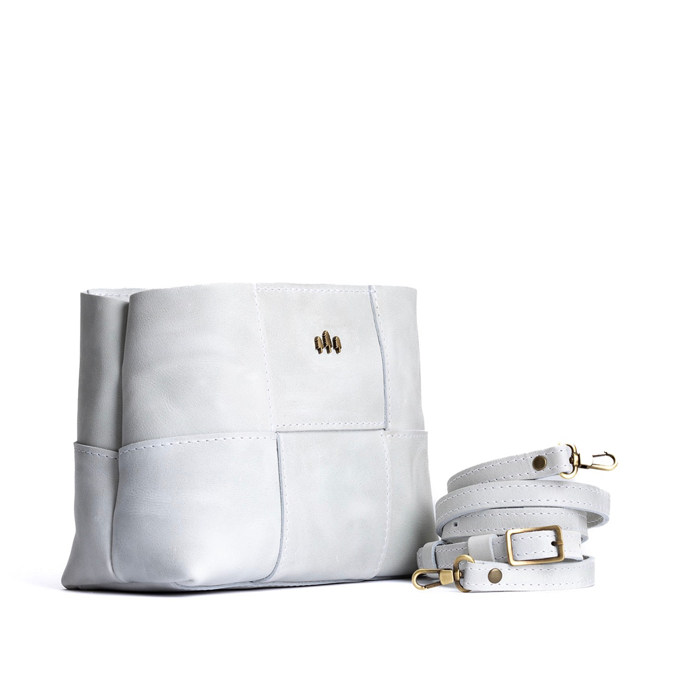 Beluga Small | Structured woven leather bag with three metal tree emblems and crossbody strap