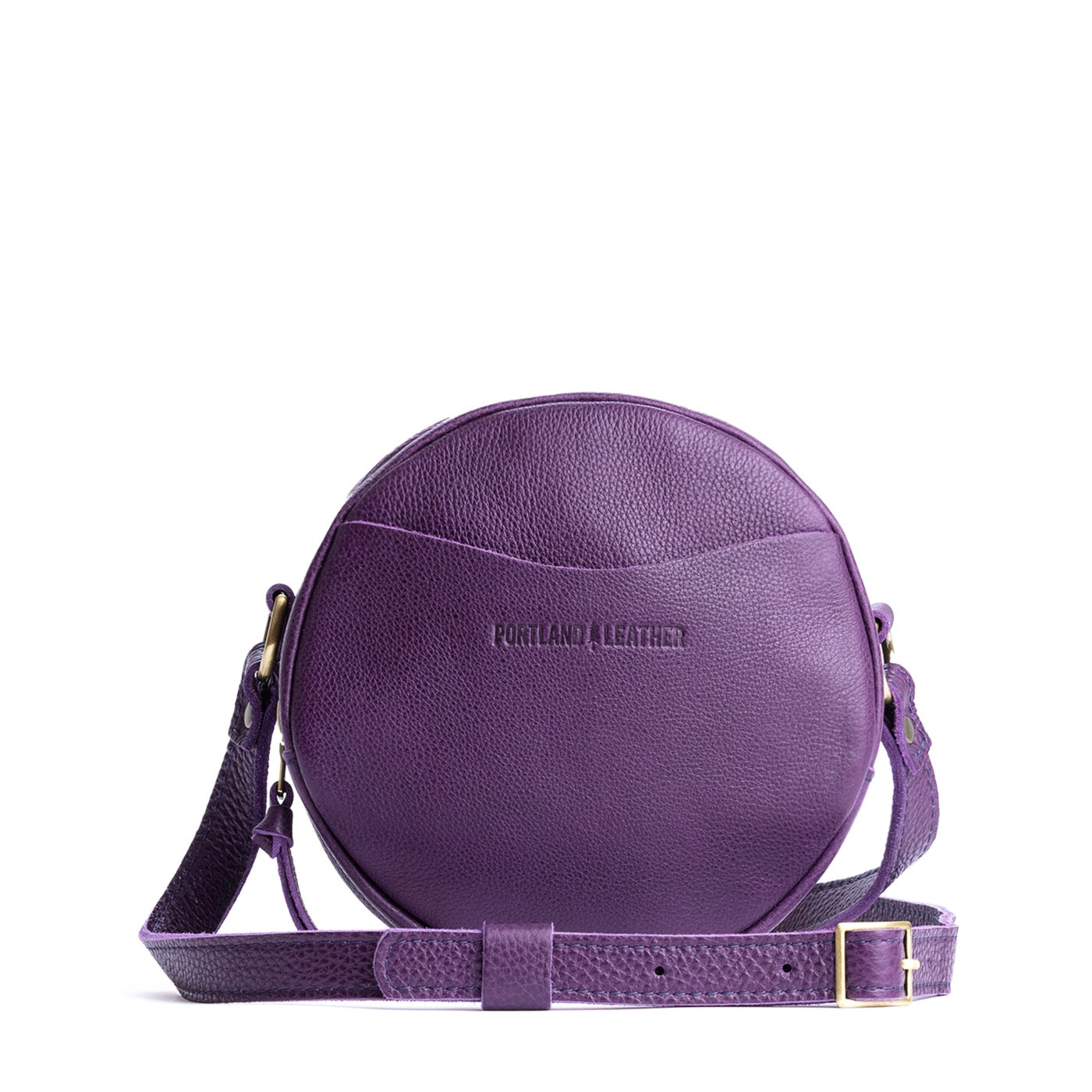 Empire*Small | Circle shaped crossbody with exterior pocket and top zipper