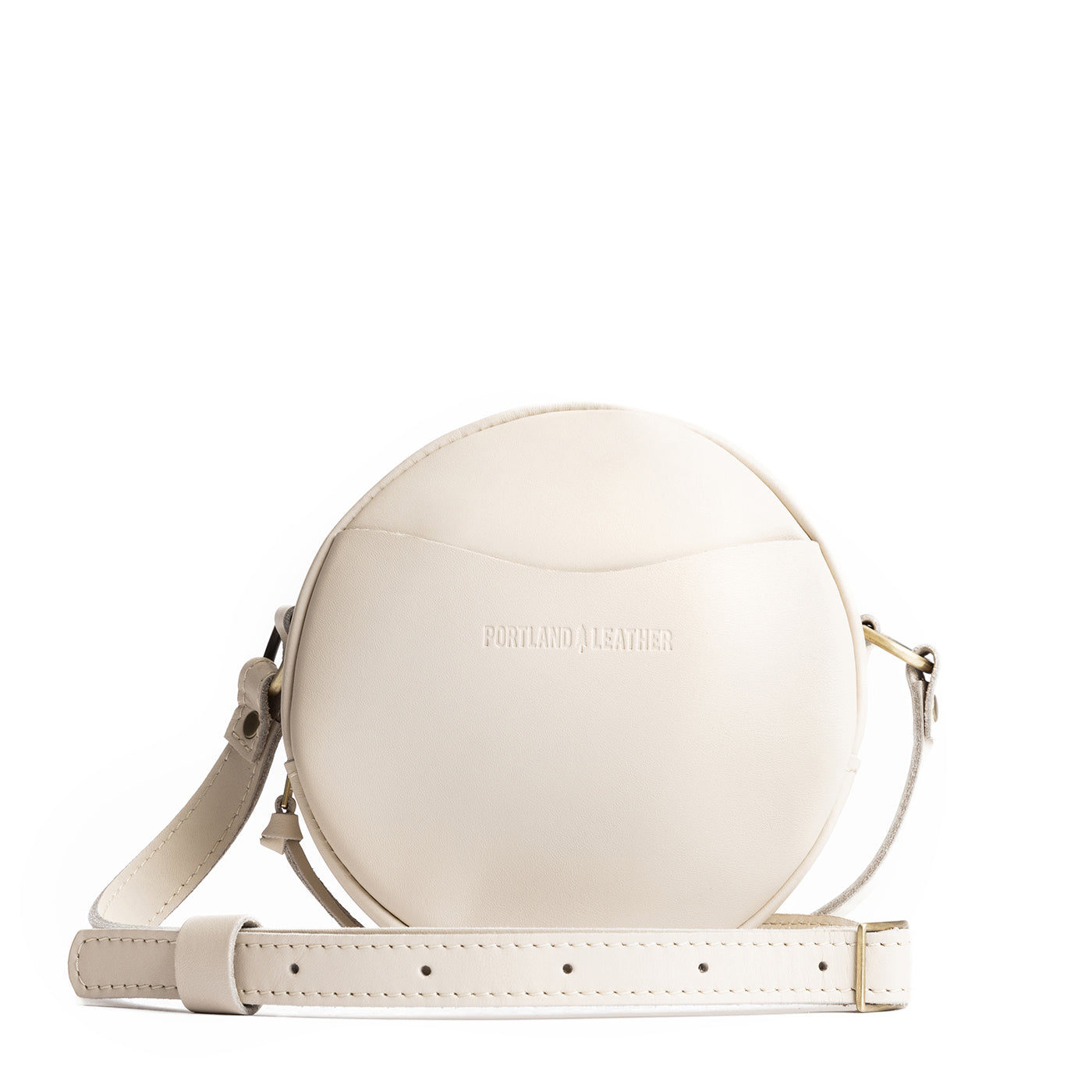 Bone Small | Circle shaped crossbody bag with top zipper