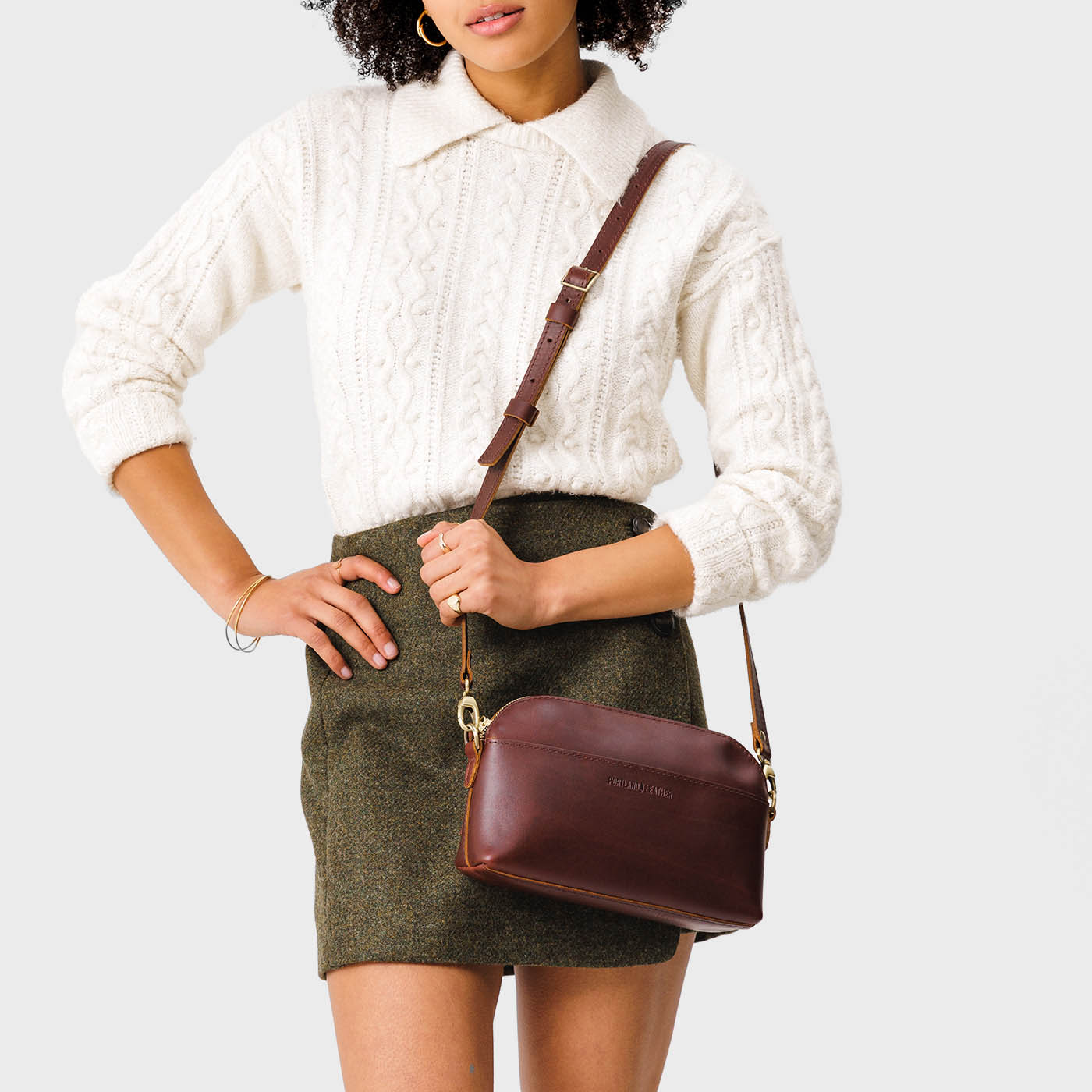 Cognac*Classic | Dome shaped crossbody purse with front and back pockets