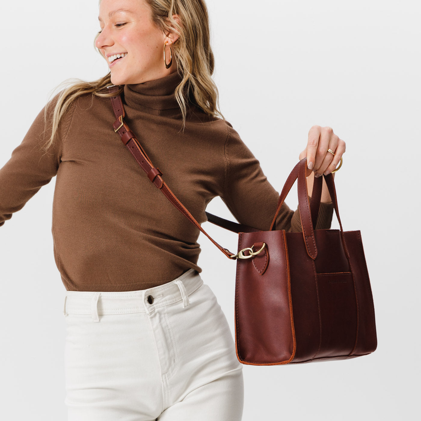 Cognac | Structured mid-size tote bag with overlapping panels and crossbody strap