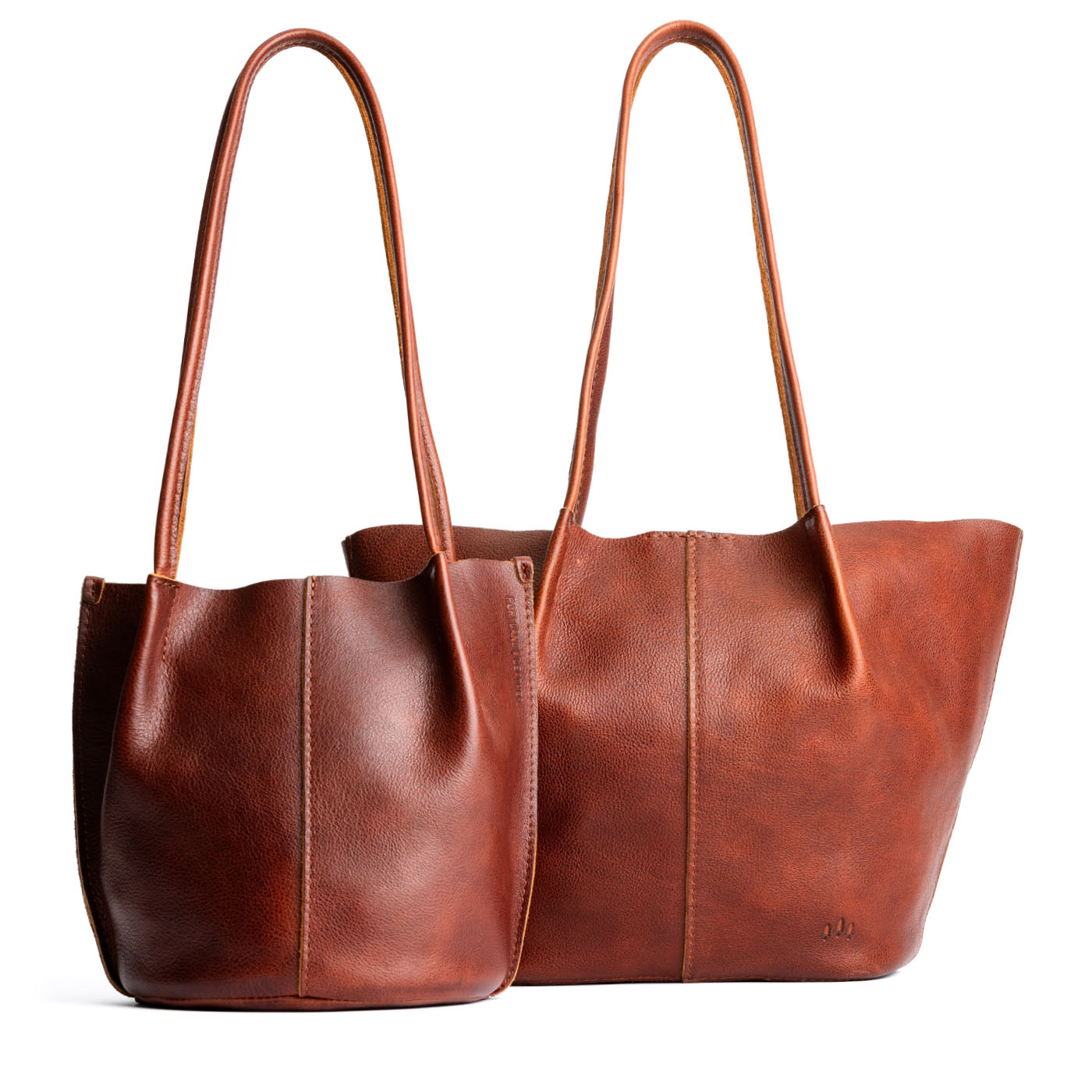 Nutmeg | Comparison of bucket shaped tote bag with matching leather handles