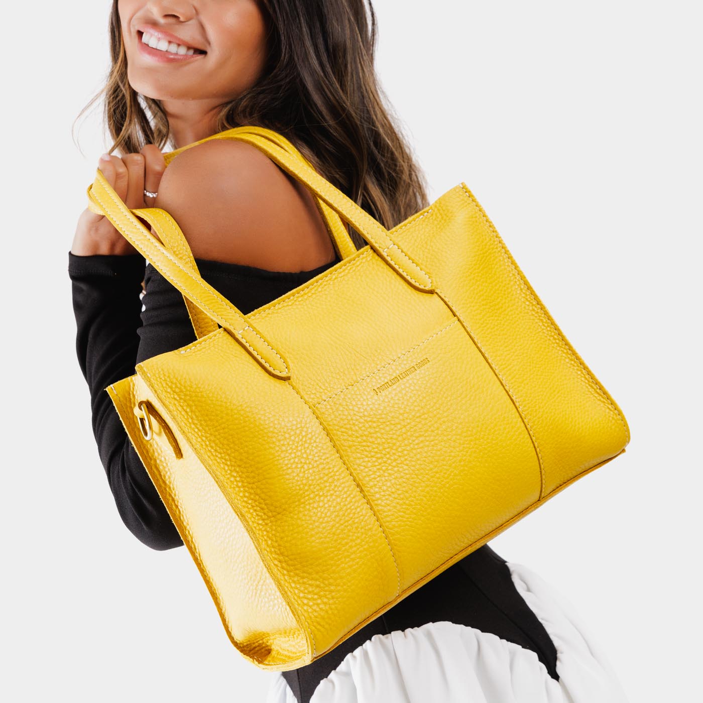 Naples East/West | Structured wide tote bag with overlapping panels and crossbody strap