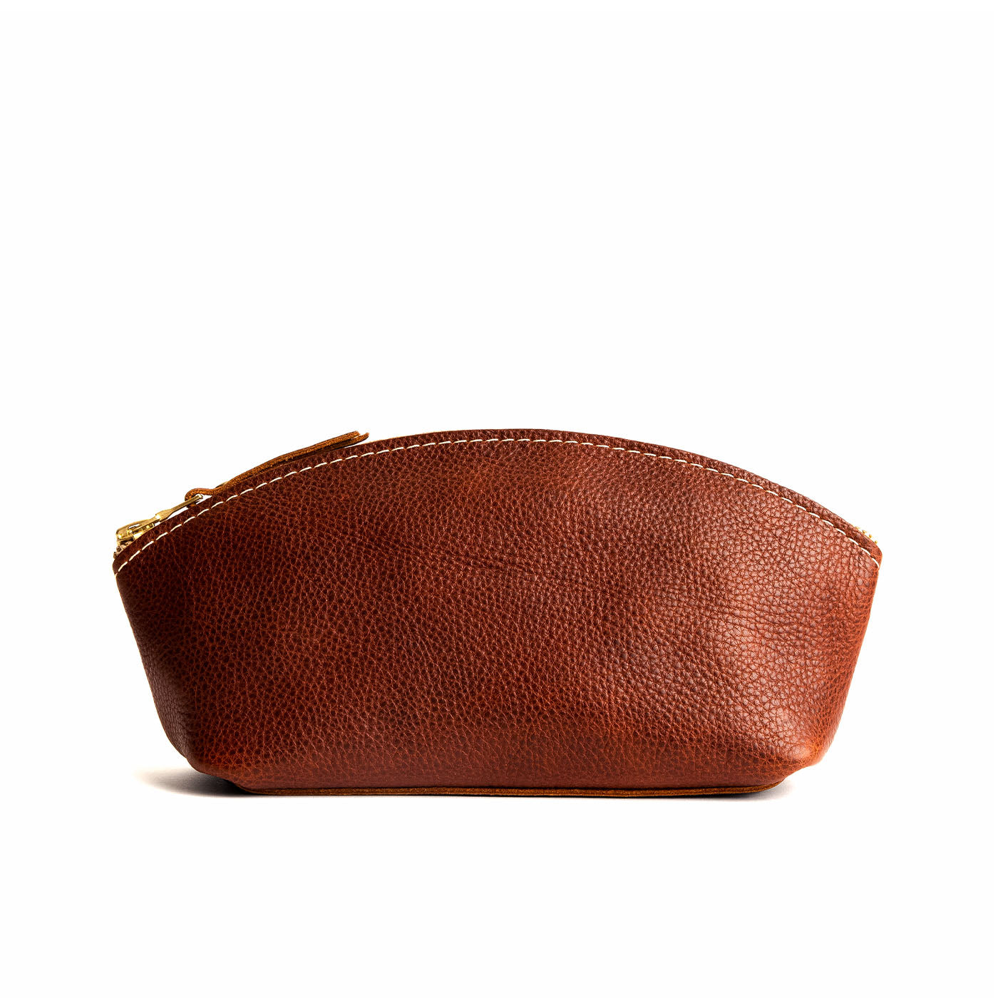 Nutmeg*Eclipse | Spacious leather makeup bag with curved seams and top zipper