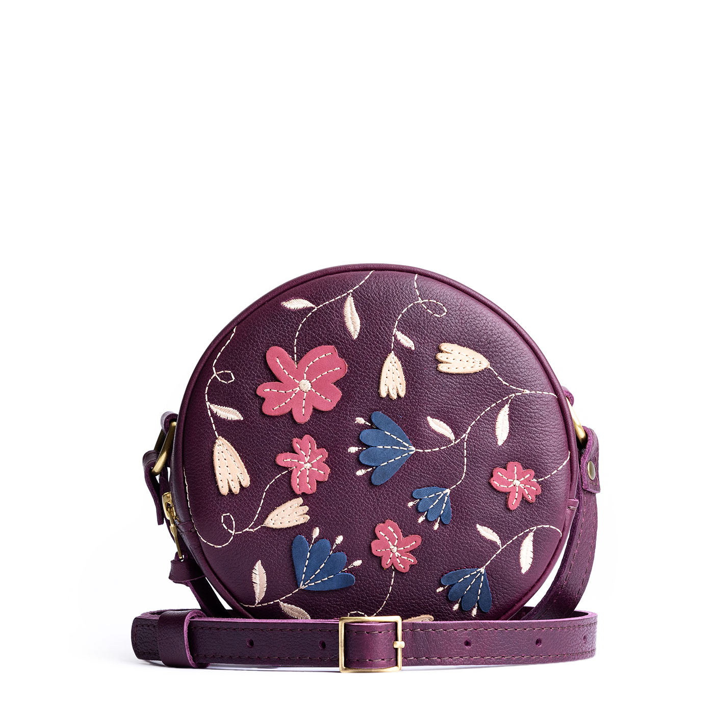 Folklore Plum Small | Circle shaped crossbody bag with embroidered flower design