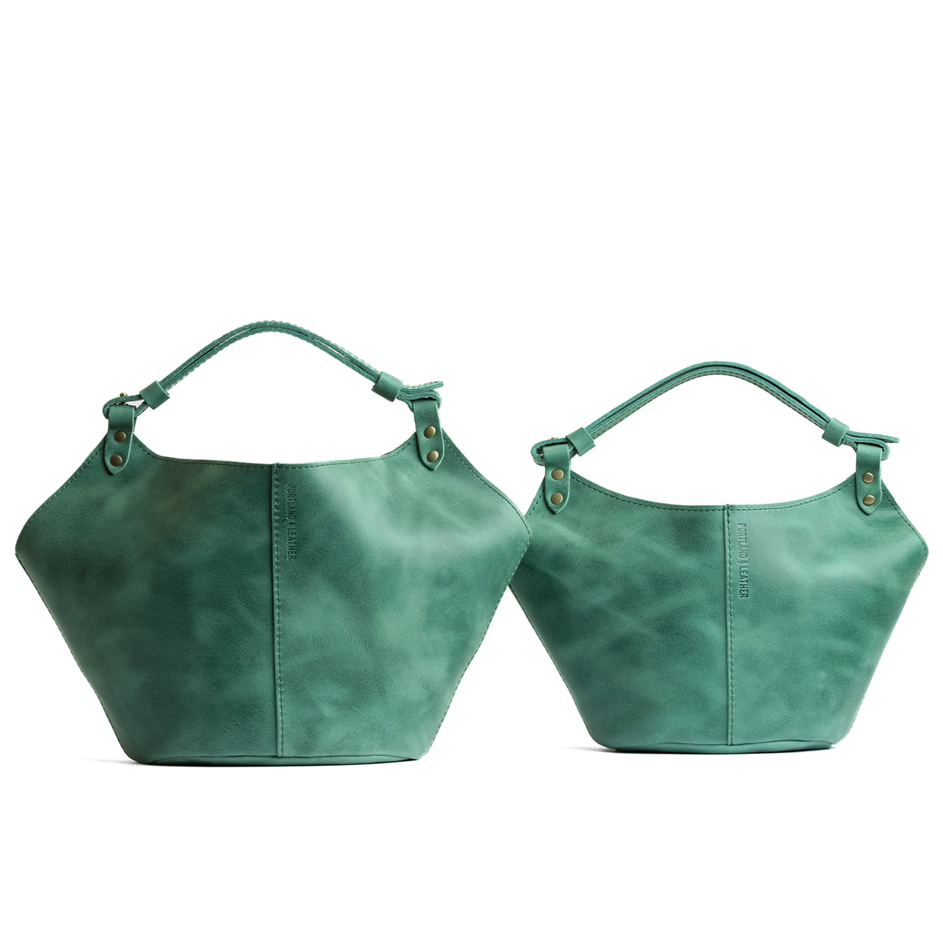 Surf | Structured bucket shaped handbag with an adjustable shoulder strap