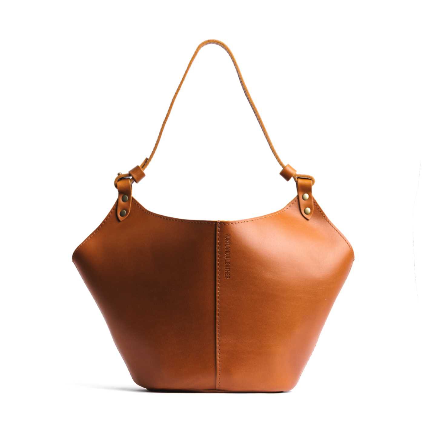 Honey*Large | Structured bucket shaped handbag with an adjustable shoulder strap