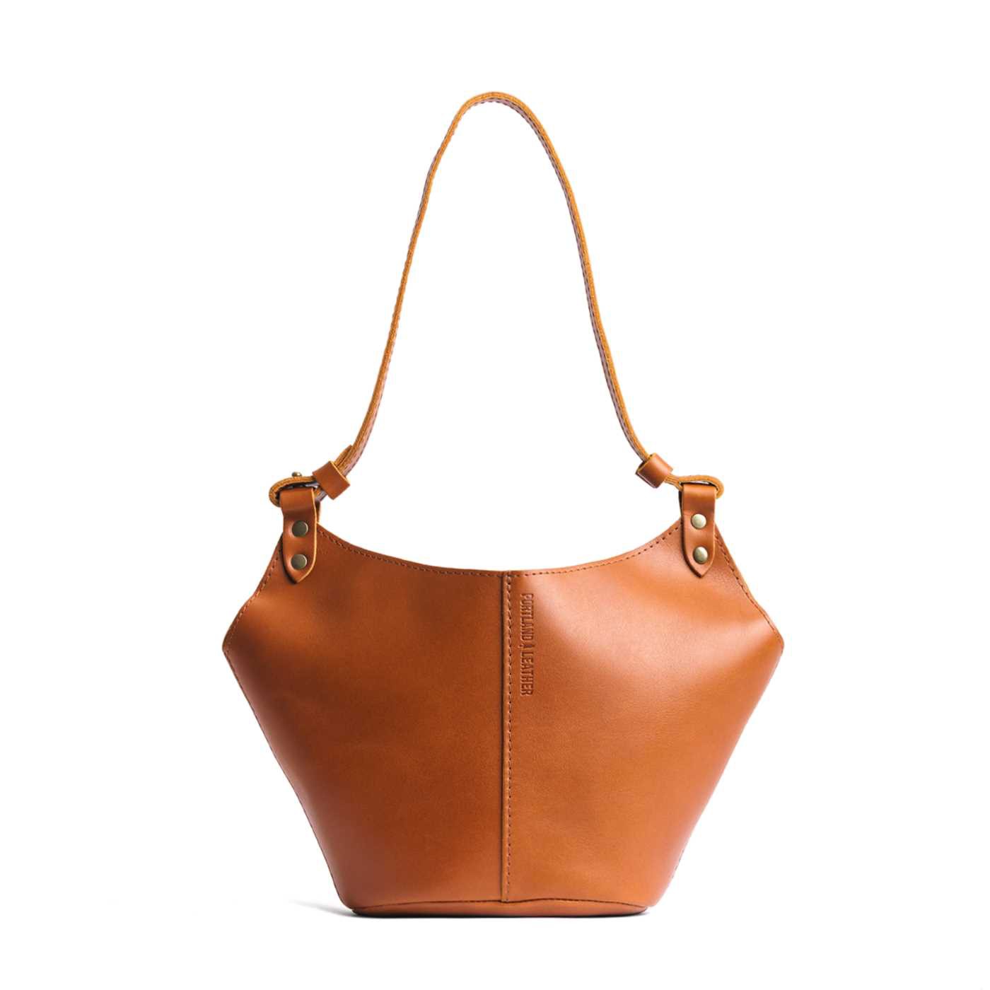 Honey Small | Structured bucket shaped handbag with an adjustable shoulder strap