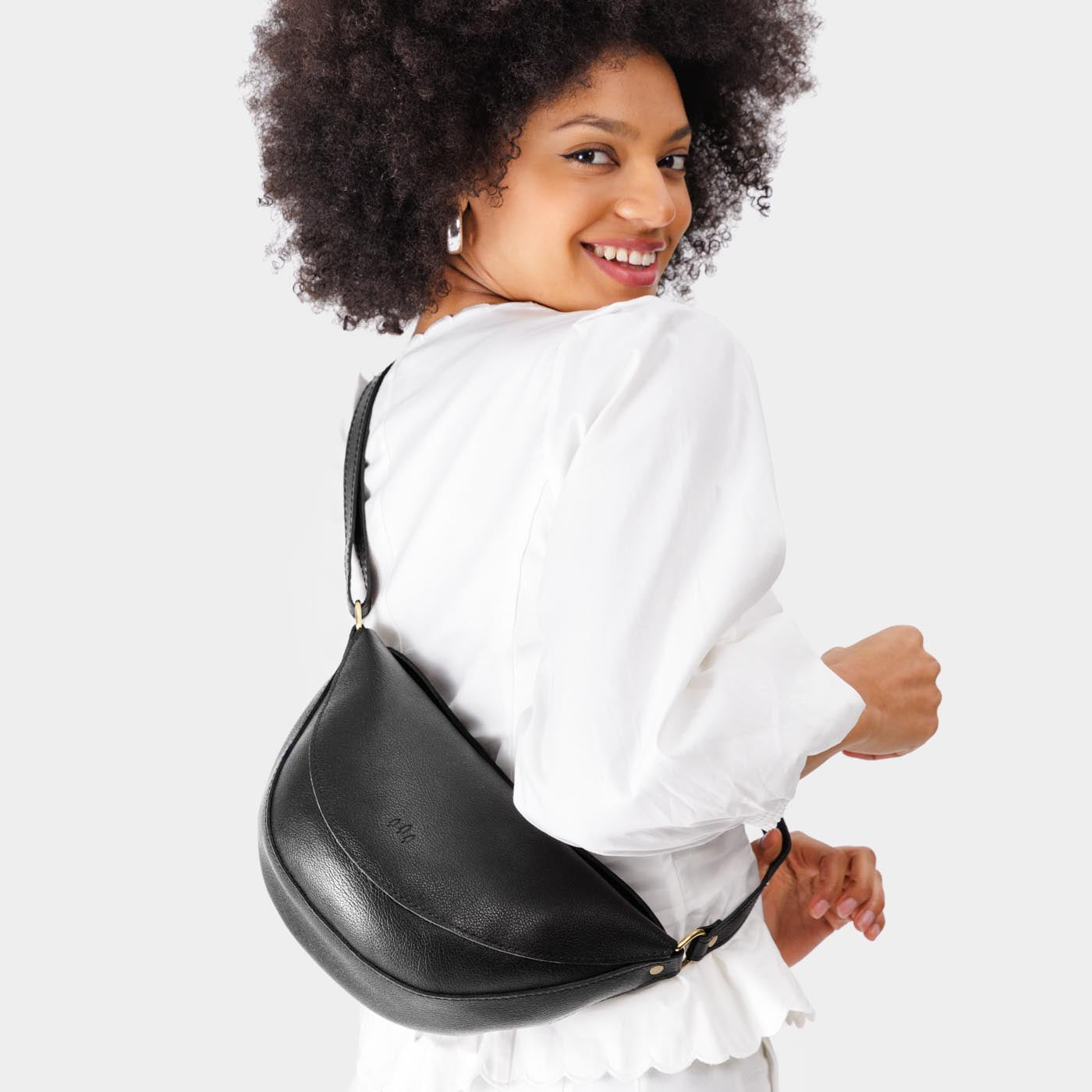 Pebbled--black Medium | Half circle shaped sling bag