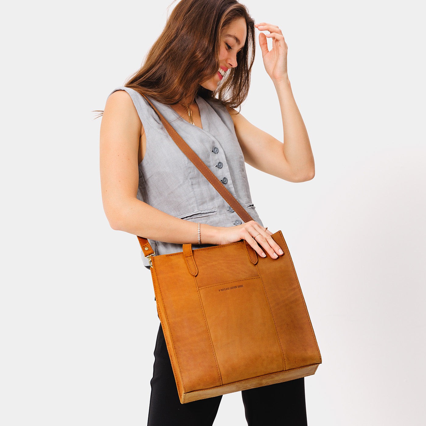  Dakota North/South  | Structured large tote bag with overlapping panels and crossbody strap