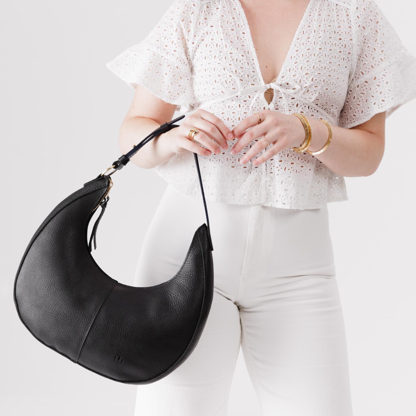 Pebbled--black Large  | Large crescent shaped shoulder bag with zipper closure and adjustable strap