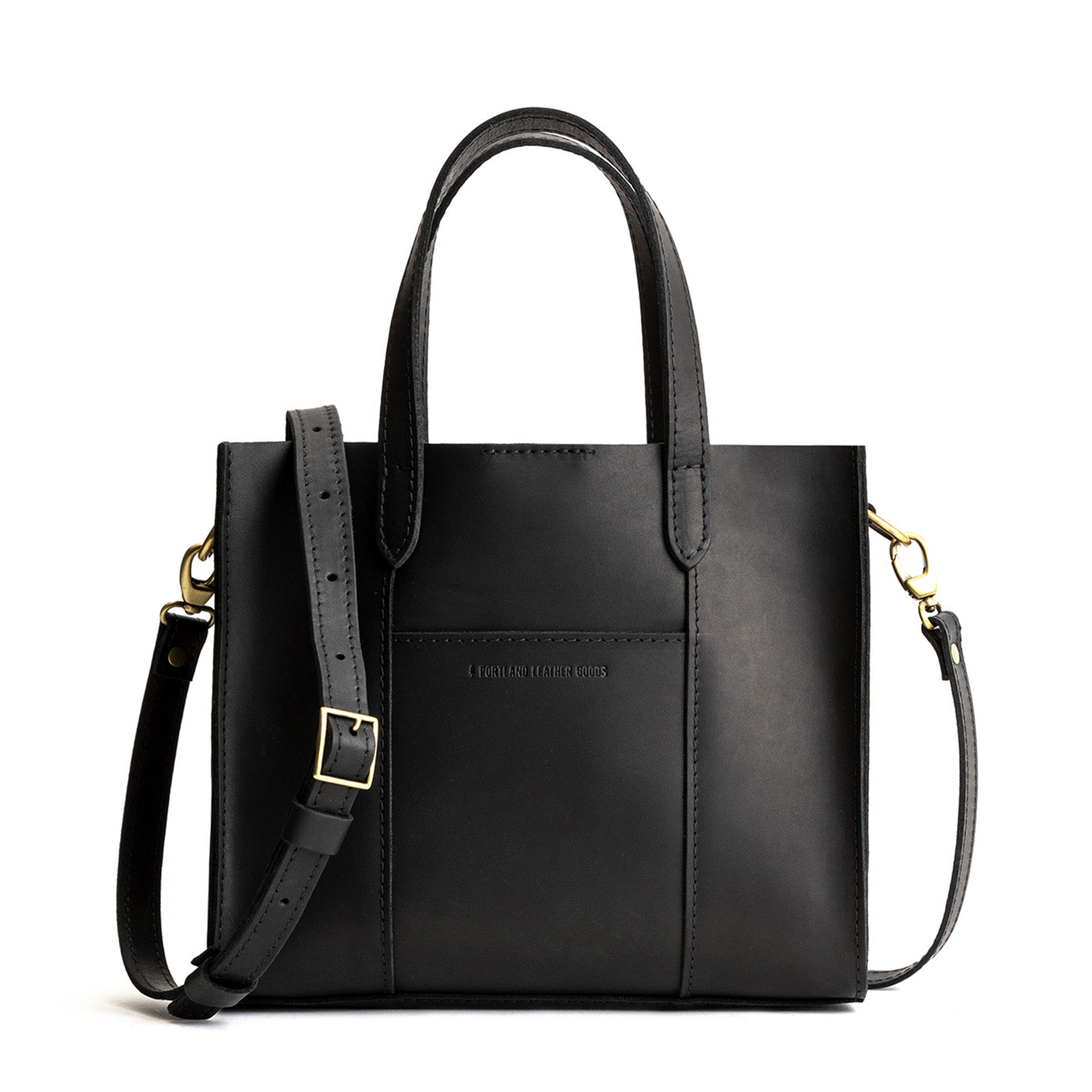 Black*Classic | Structured mid-size tote bag with overlapping panels and crossbody strap