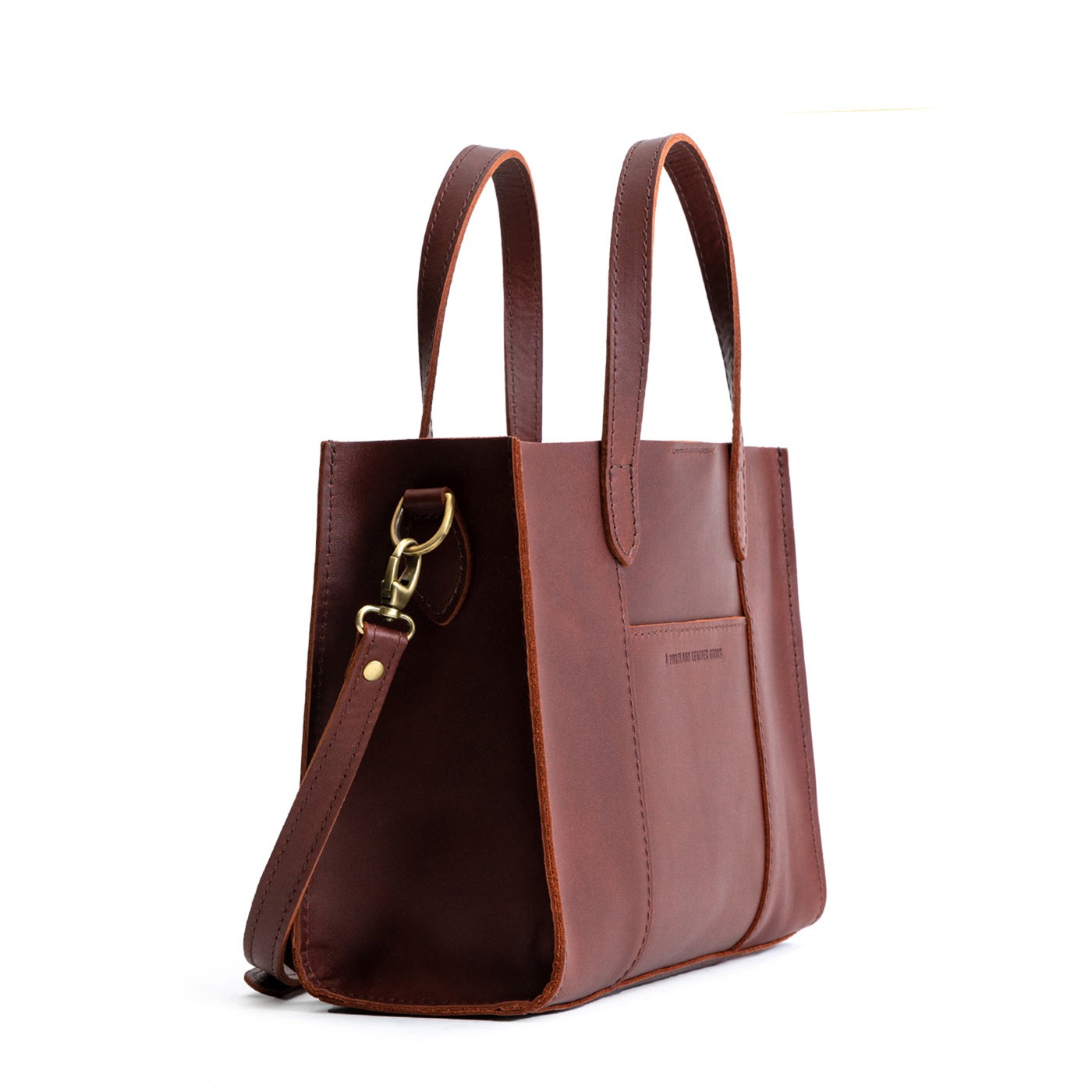 Cognac | Structured mid-size tote bag with overlapping panels and crossbody strap