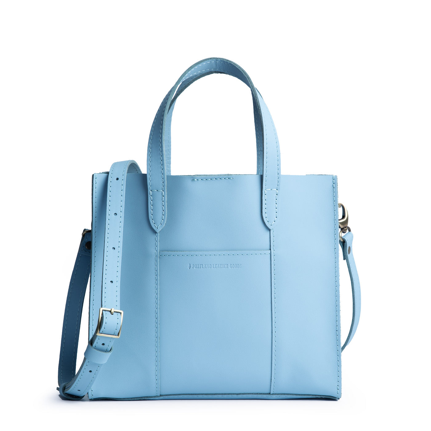 Glacial Blue | Structured mid-size tote bag with overlapping panels and crossbody strap