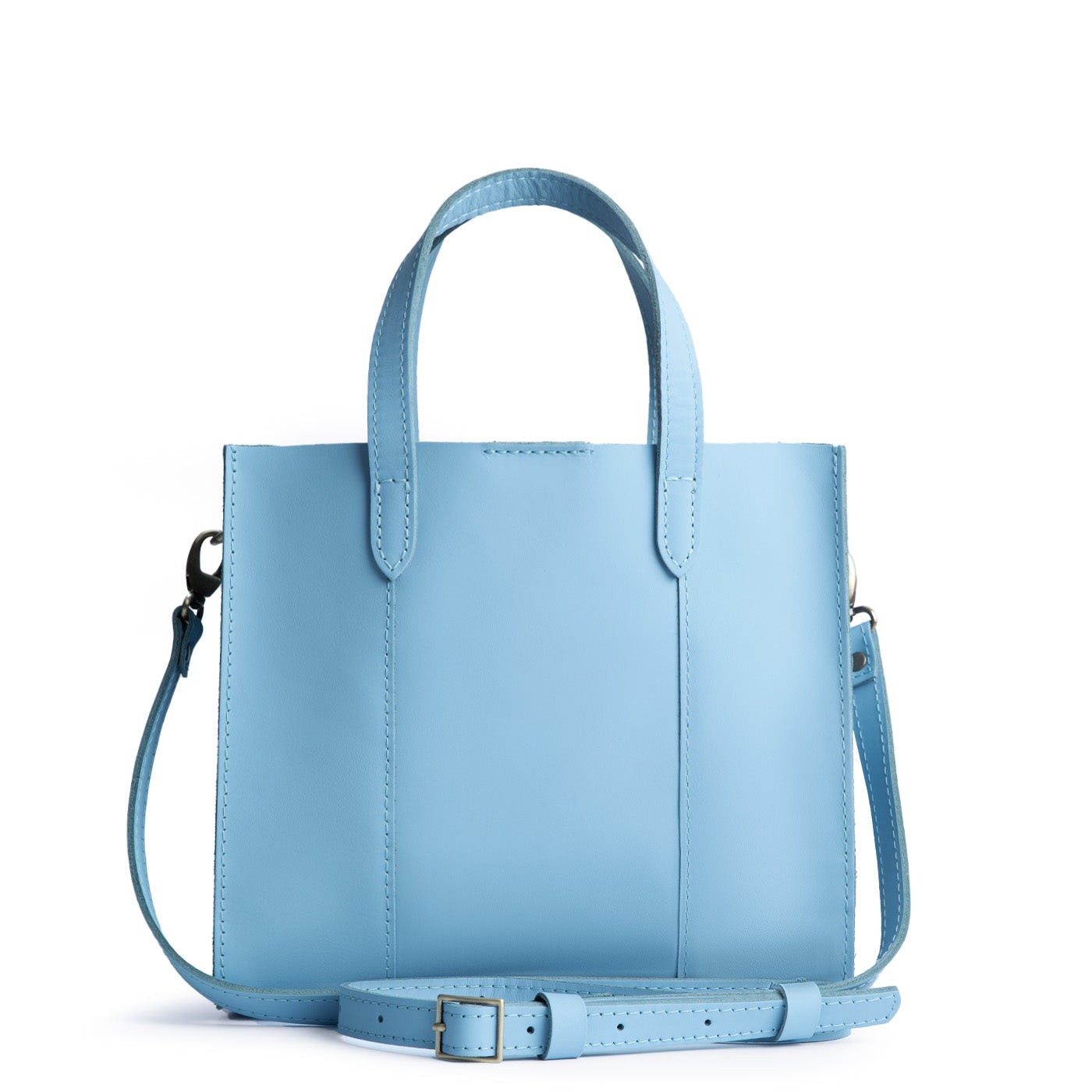 Glacial Blue | Structured mid-size tote bag with overlapping panels and crossbody strap