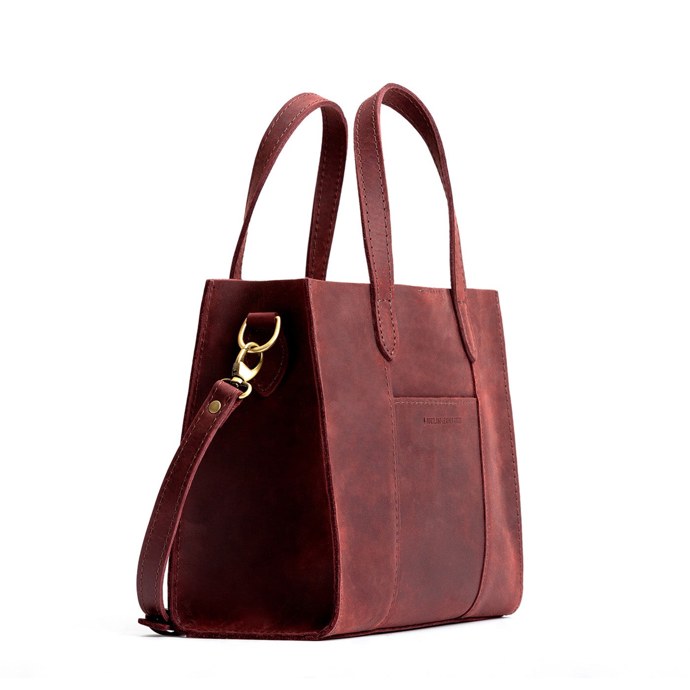 Merlot | Structured mid-size tote bag with overlapping panels and crossbody strap