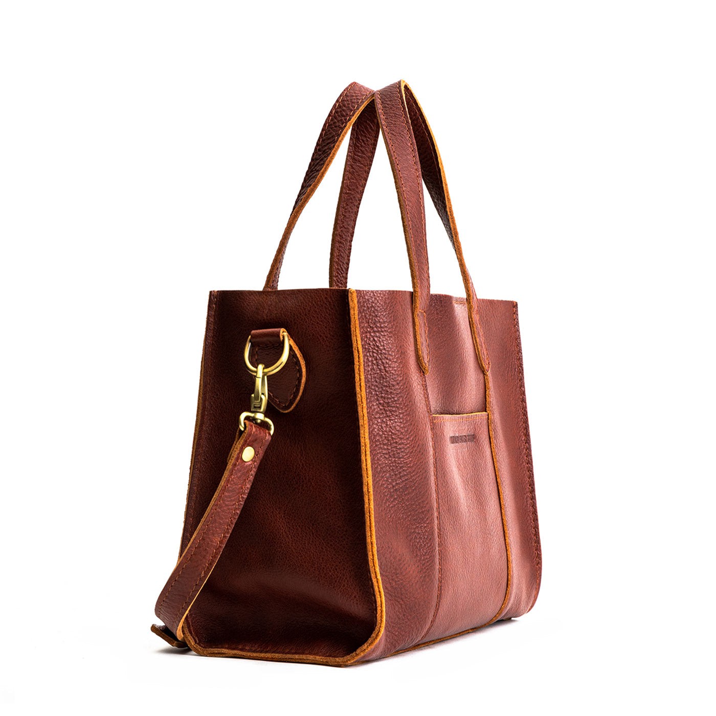 Nutmeg | Structured mid-size tote bag with overlapping panels and crossbody strap