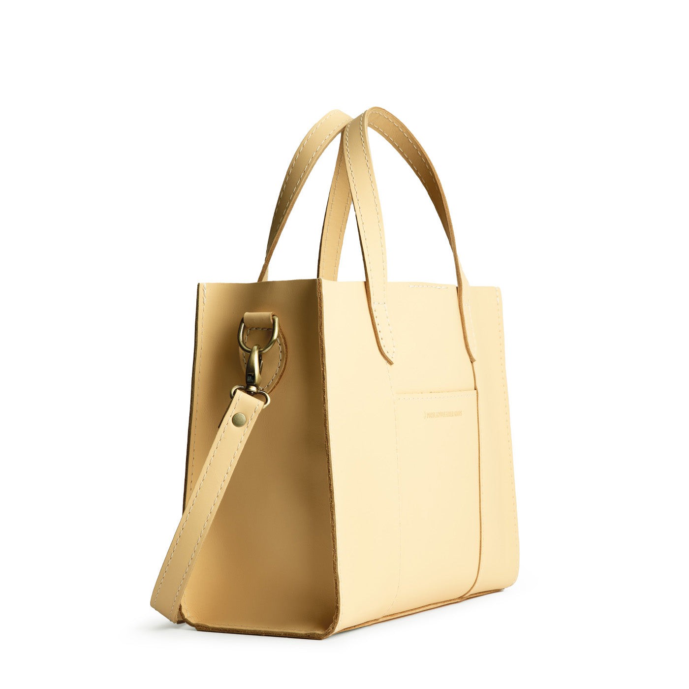 Vanilla | Structured mid-size tote bag with overlapping panels and crossbody strap