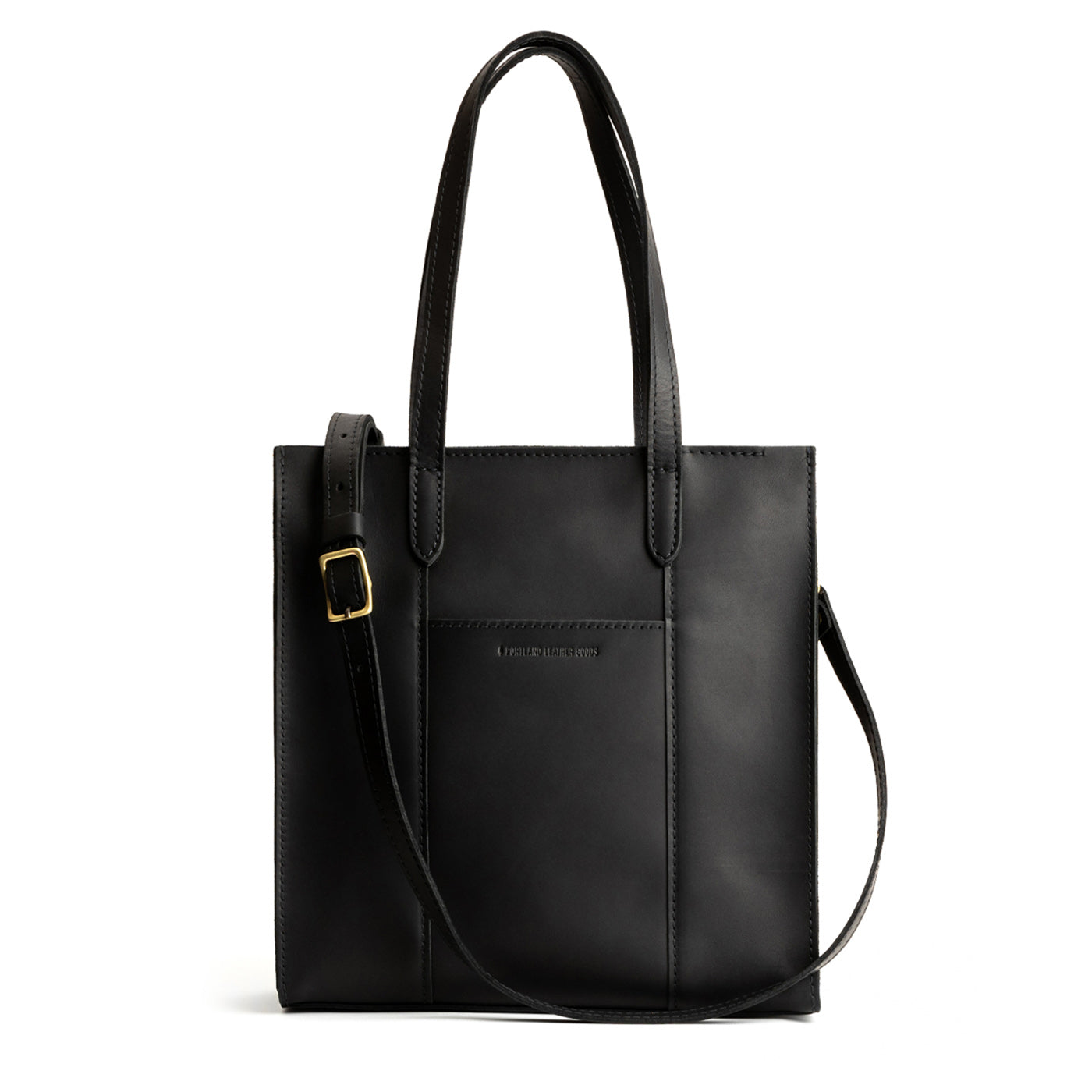 Black North/South | Structured large tote bag with overlapping panels and crossbody strap