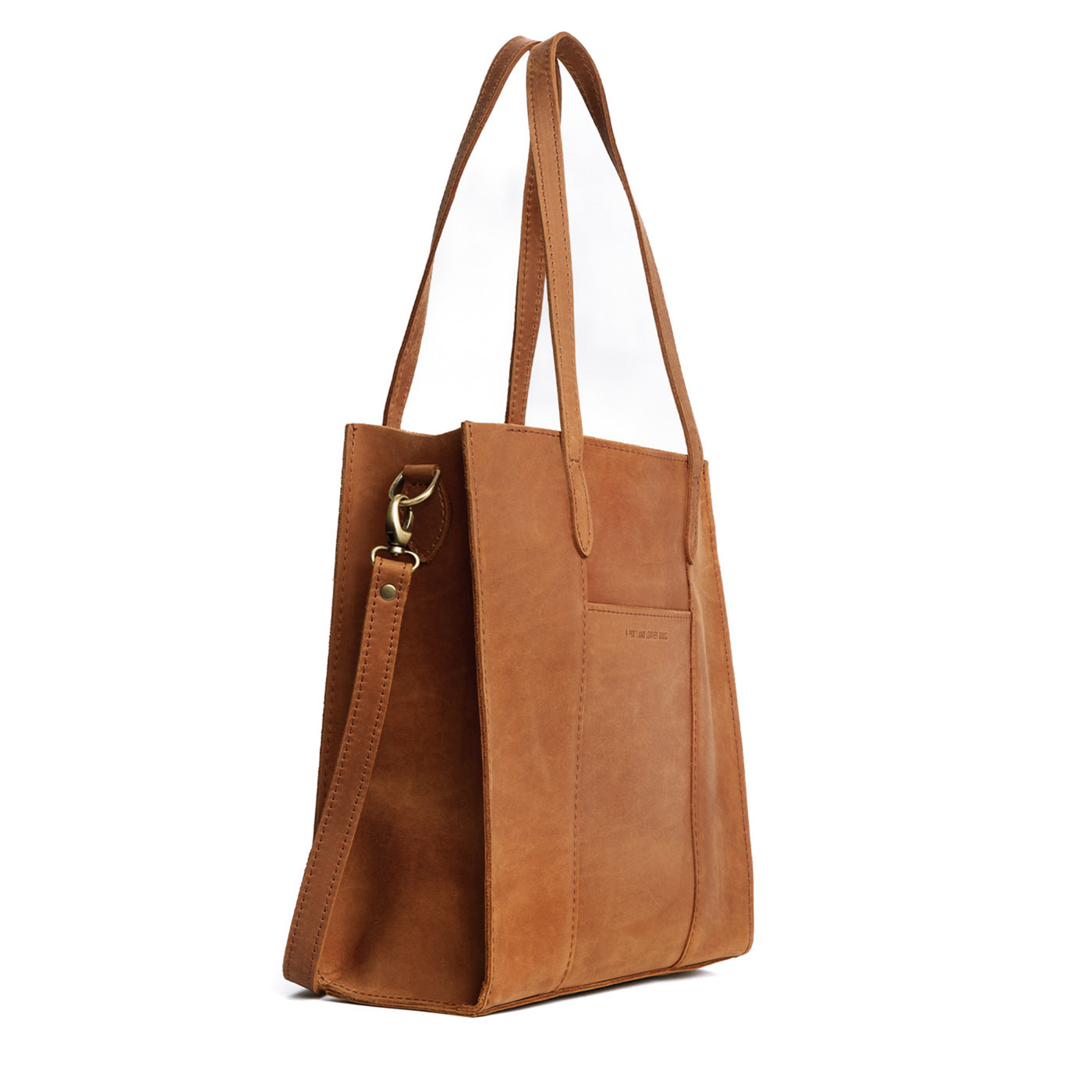  Dakota North/South | Structured large tote bag with overlapping panels and crossbody strap