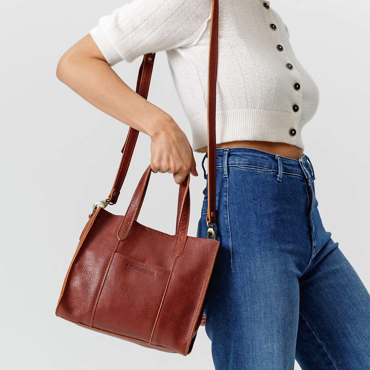 Nutmeg | Structured mid-size tote bag with overlapping panels and crossbody strap