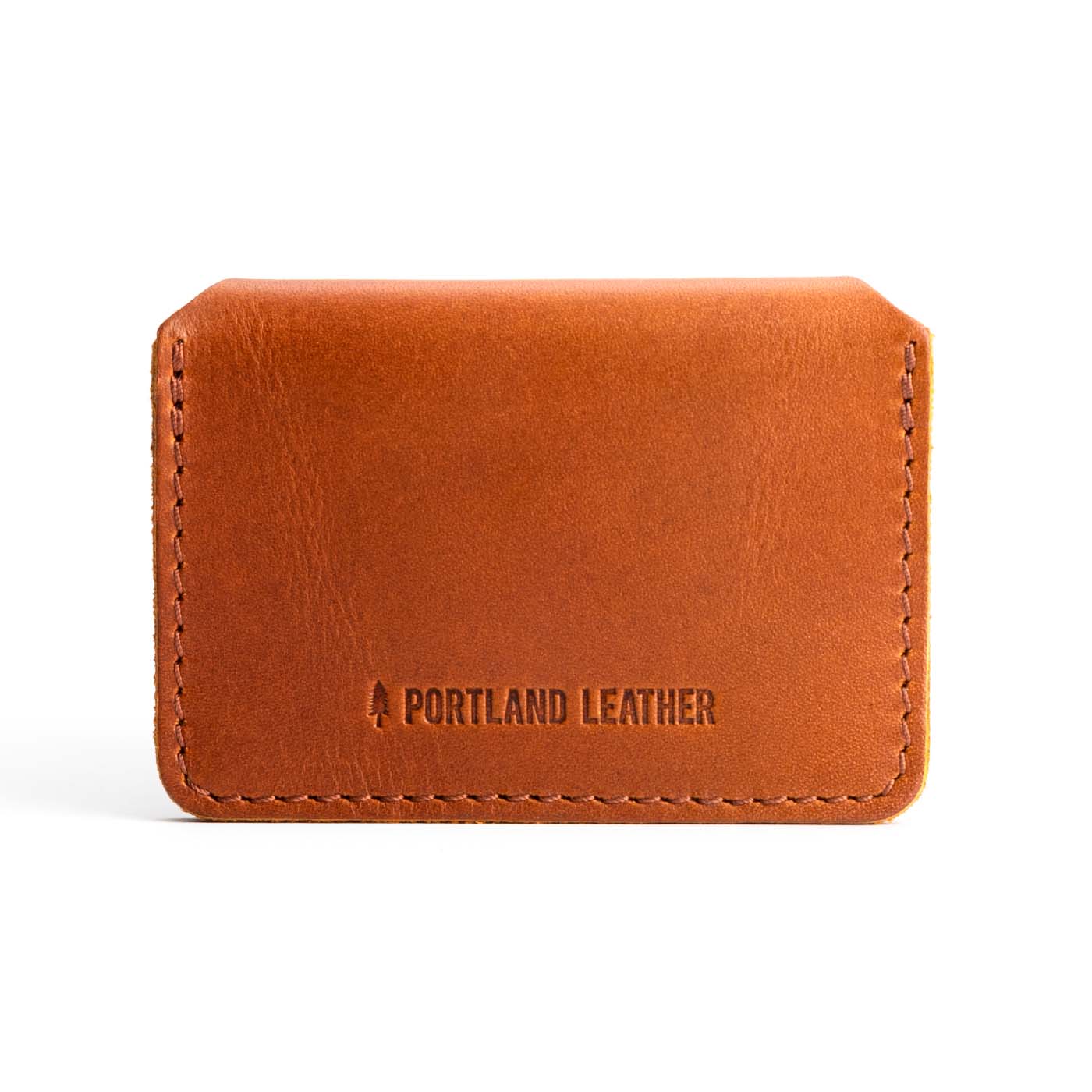 Honey | Backside of small leather wallet with debossed PLG logo