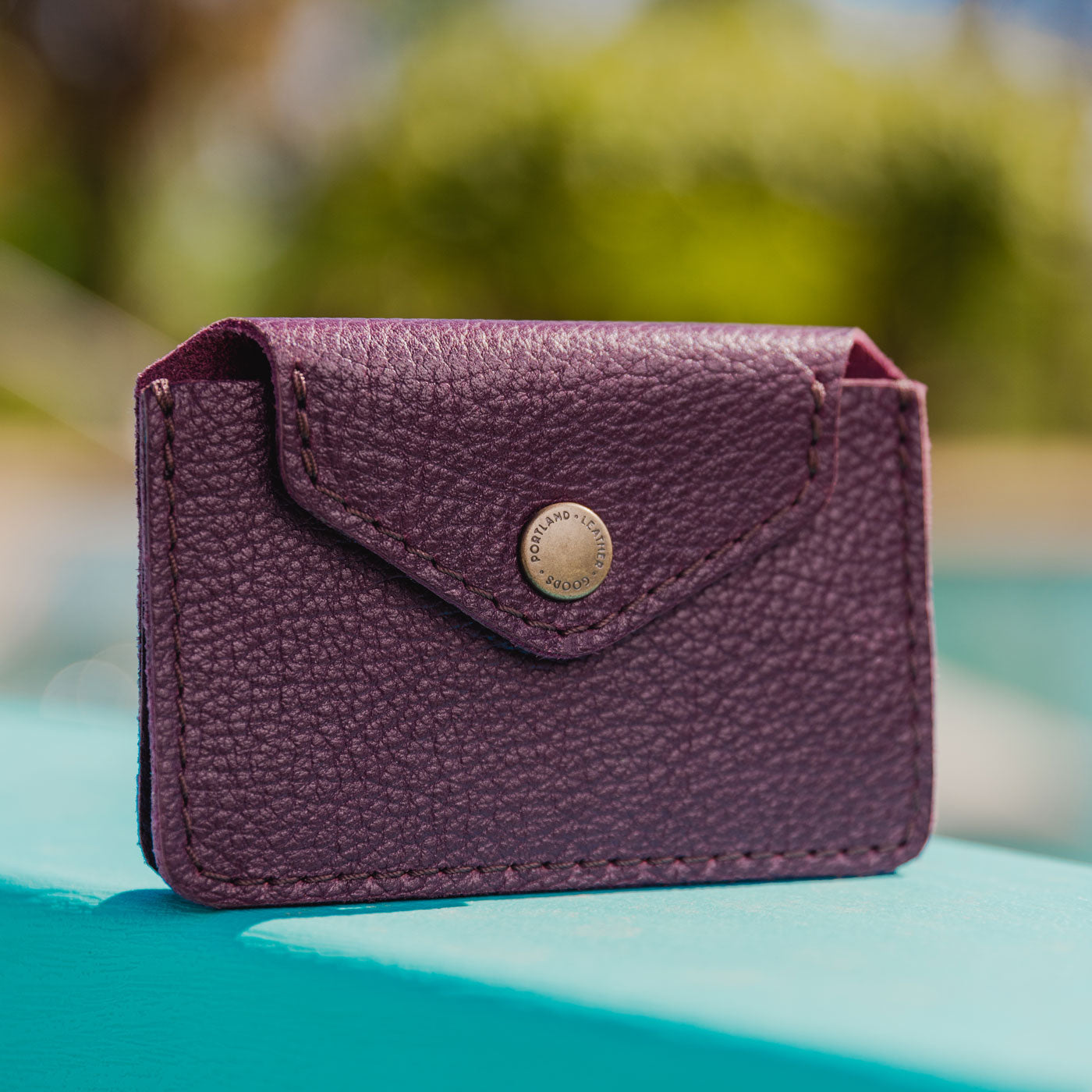 Plum |  | Small leather wallet with snap closure