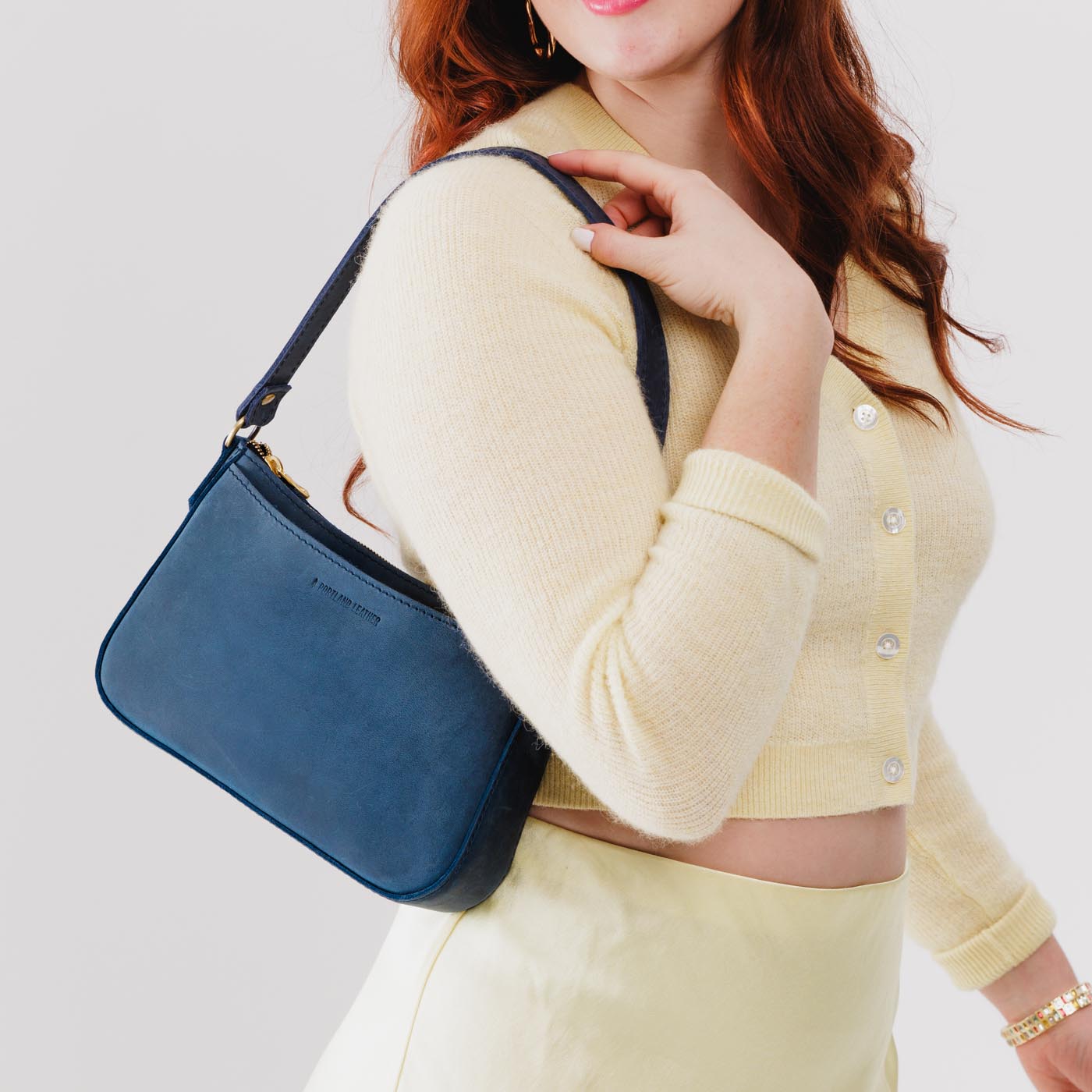  Deep Water | Petite bean shaped shoulder bag with a zipper closure