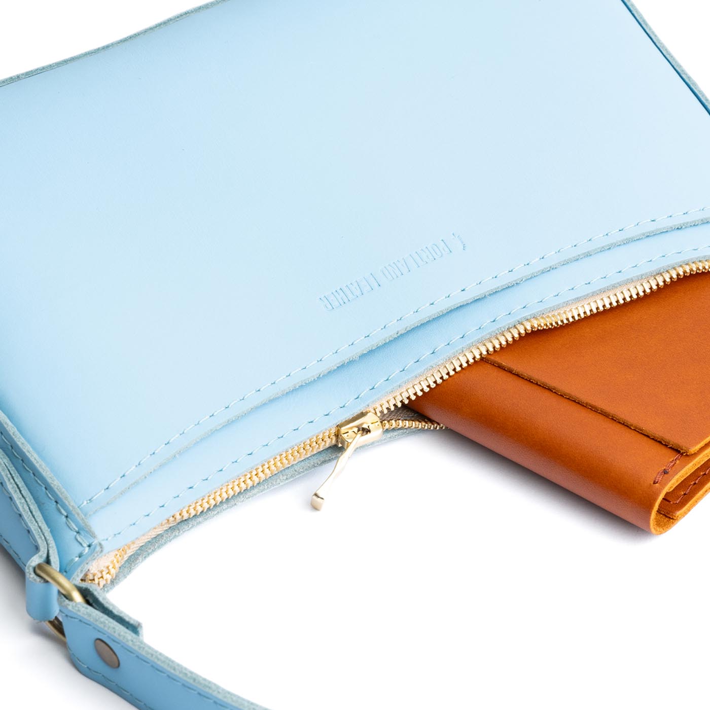 Glacial Blue | Petite bean shaped shoulder bag with a zipper closure