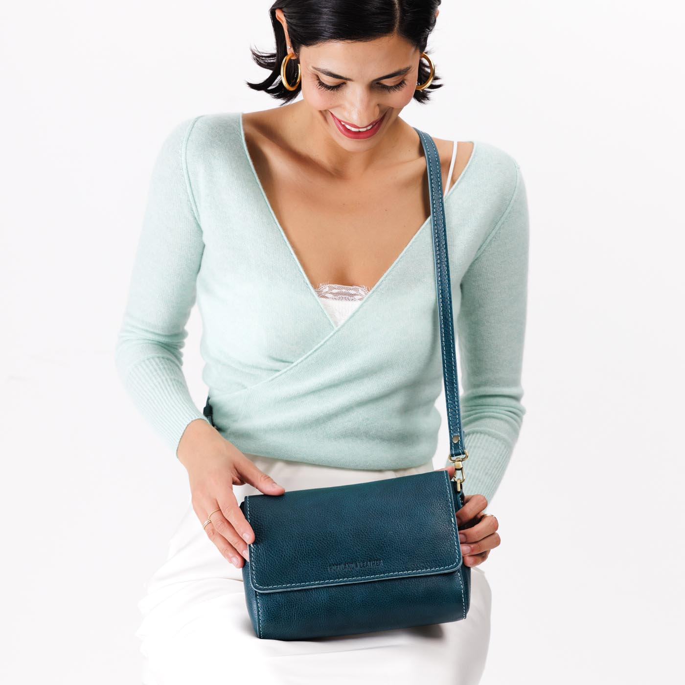 Lagoon*Medium | Model wearing leather Crossbody Bag with Magnetic Messenger Bag Closure