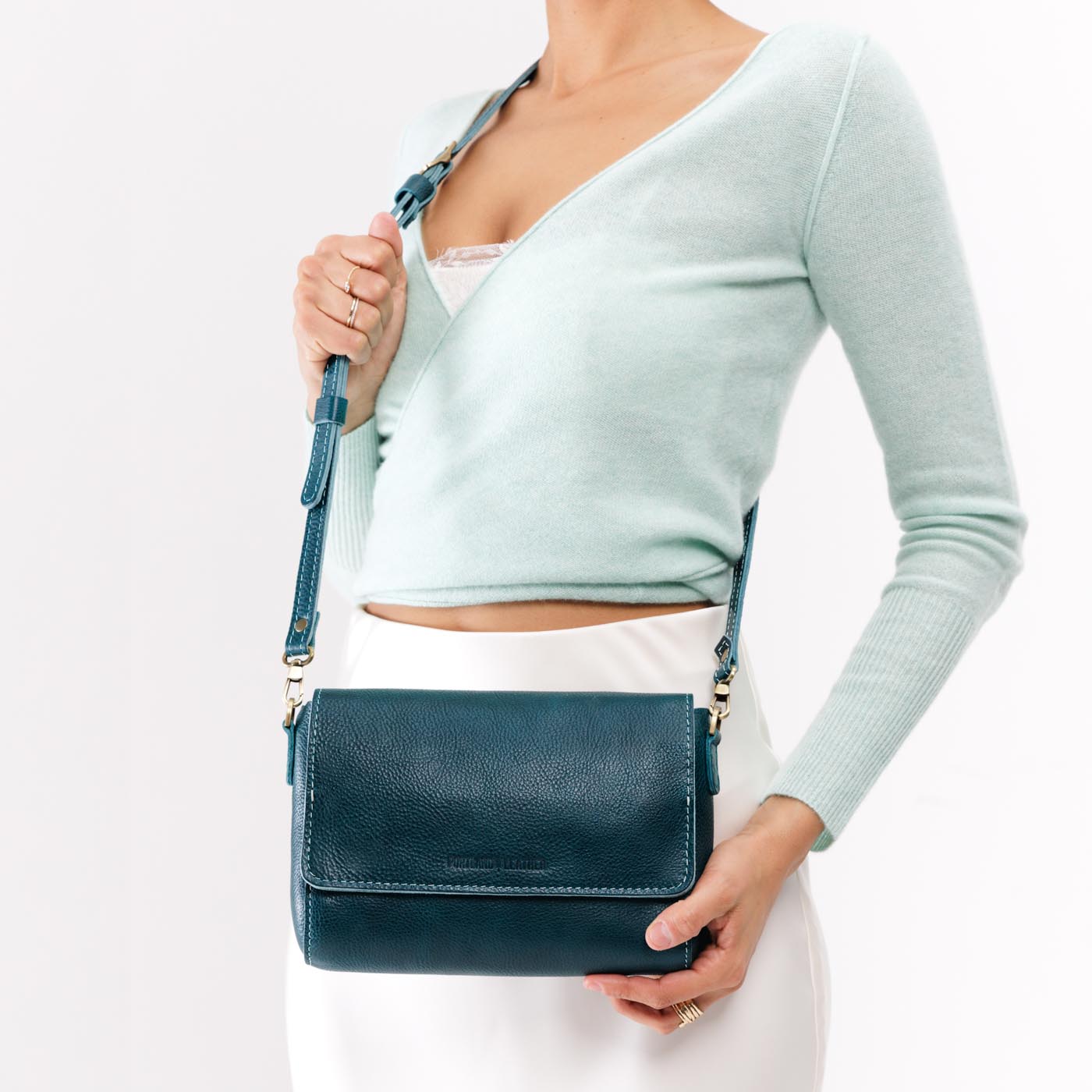 Lagoon*Medium | Model wearing leather Crossbody Bag with Magnetic Messenger Bag Closure