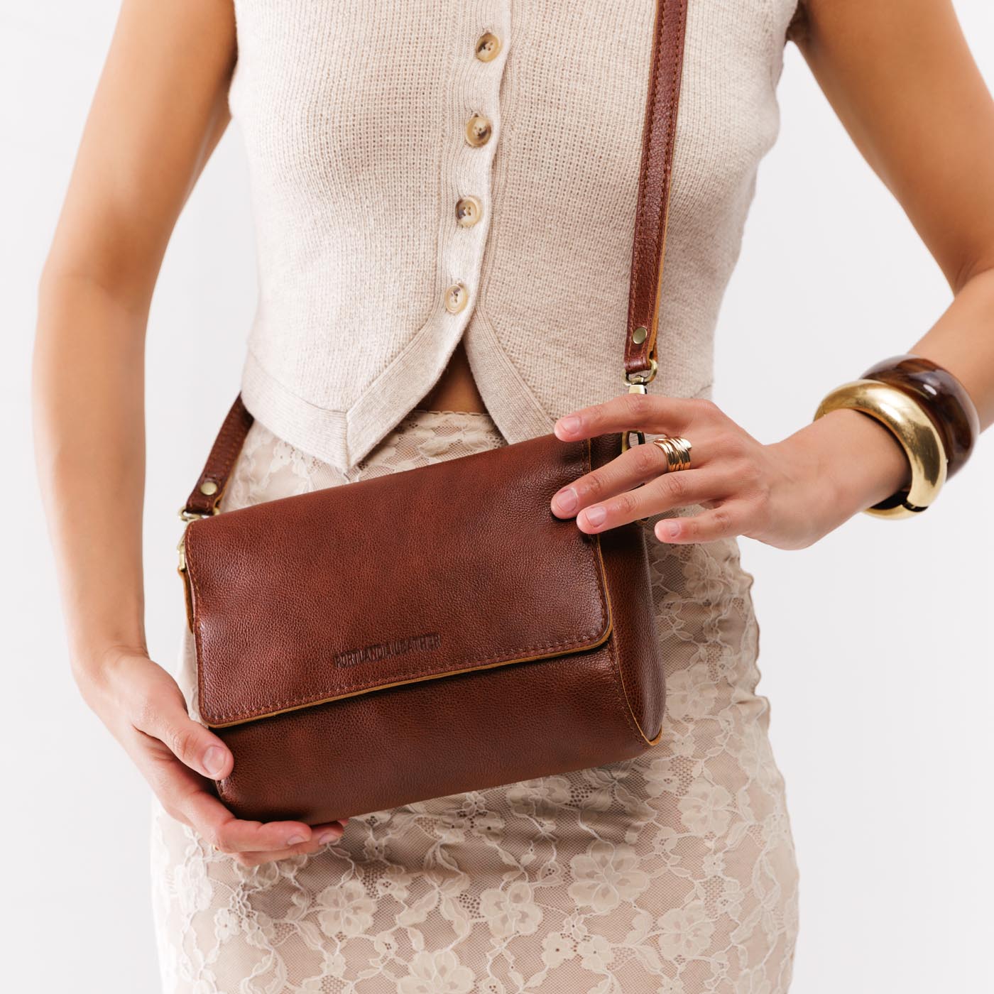 Nutmeg*Medium | Model wearing leather Crossbody Bag with Magnetic Messenger Bag Closure