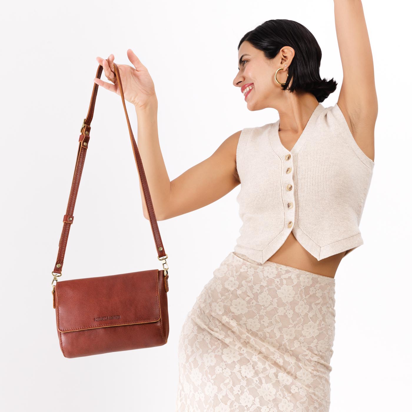 Nutmeg*Medium | Model wearing leather Crossbody Bag with Magnetic Messenger Bag Closure