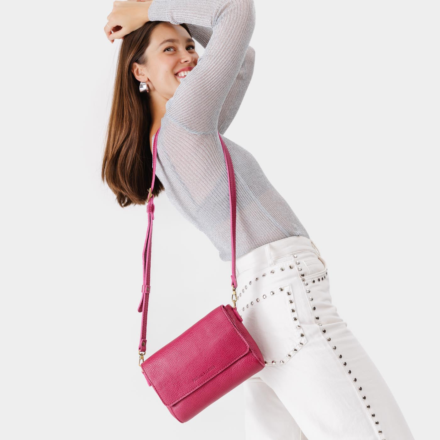 Cosmo*Medium | Model wearing leather Crossbody Bag with Magnetic Messenger Bag Closure