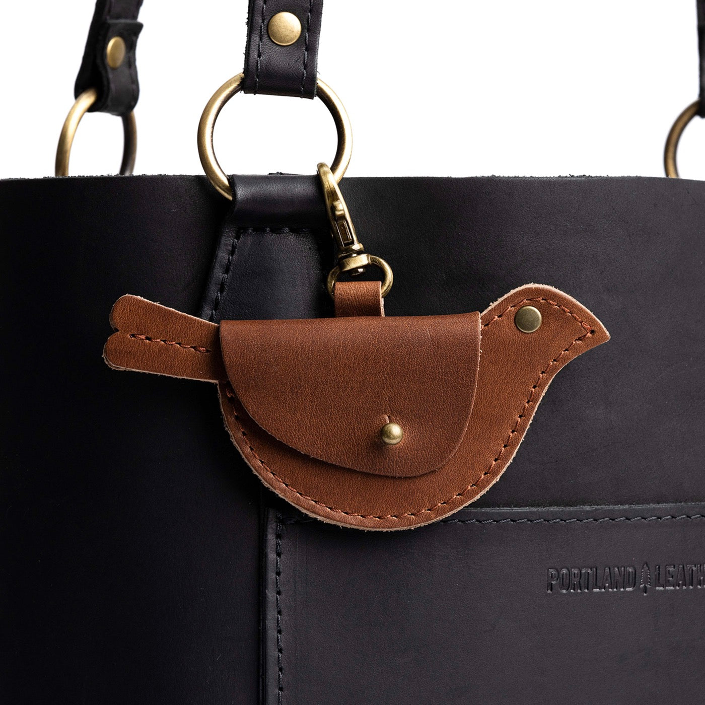 English Tan | Bird shaped pouch with button closure and lobster clasp