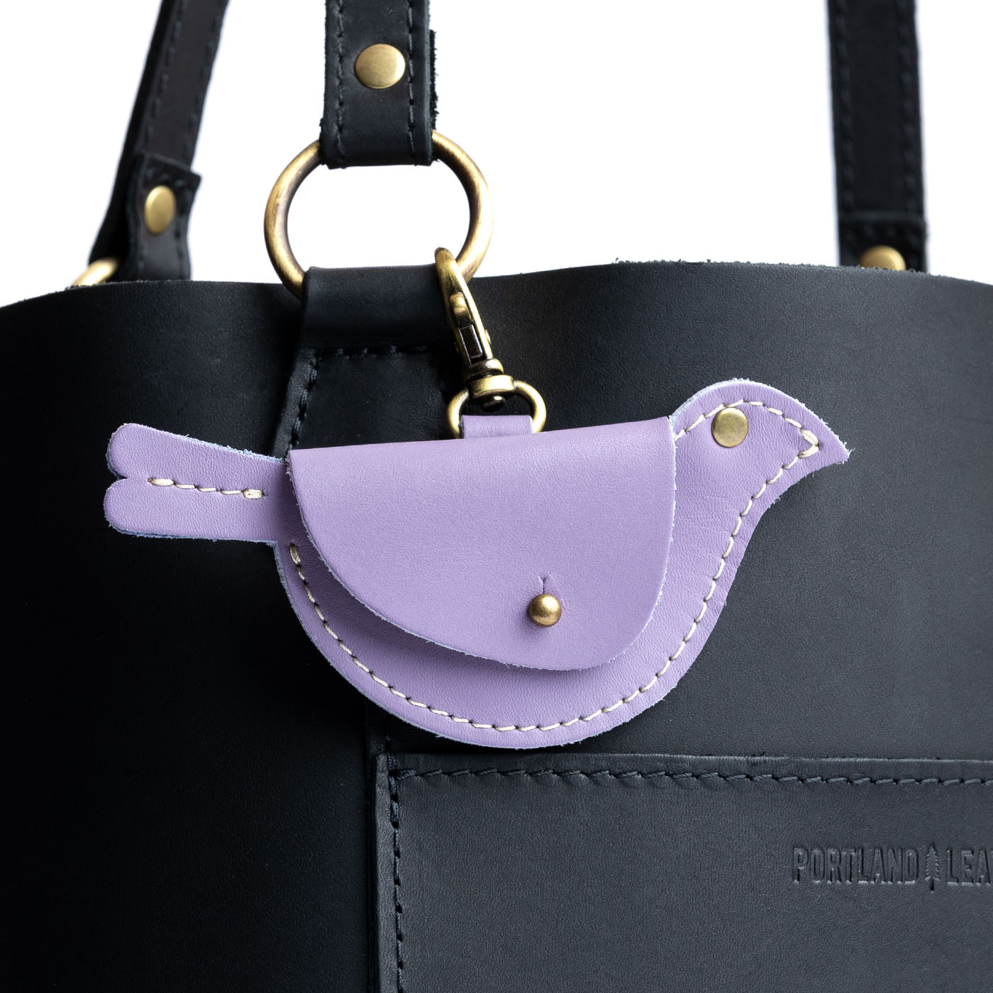 All Color: Lavender | Bird shaped pouch with button closure and lobster clasp