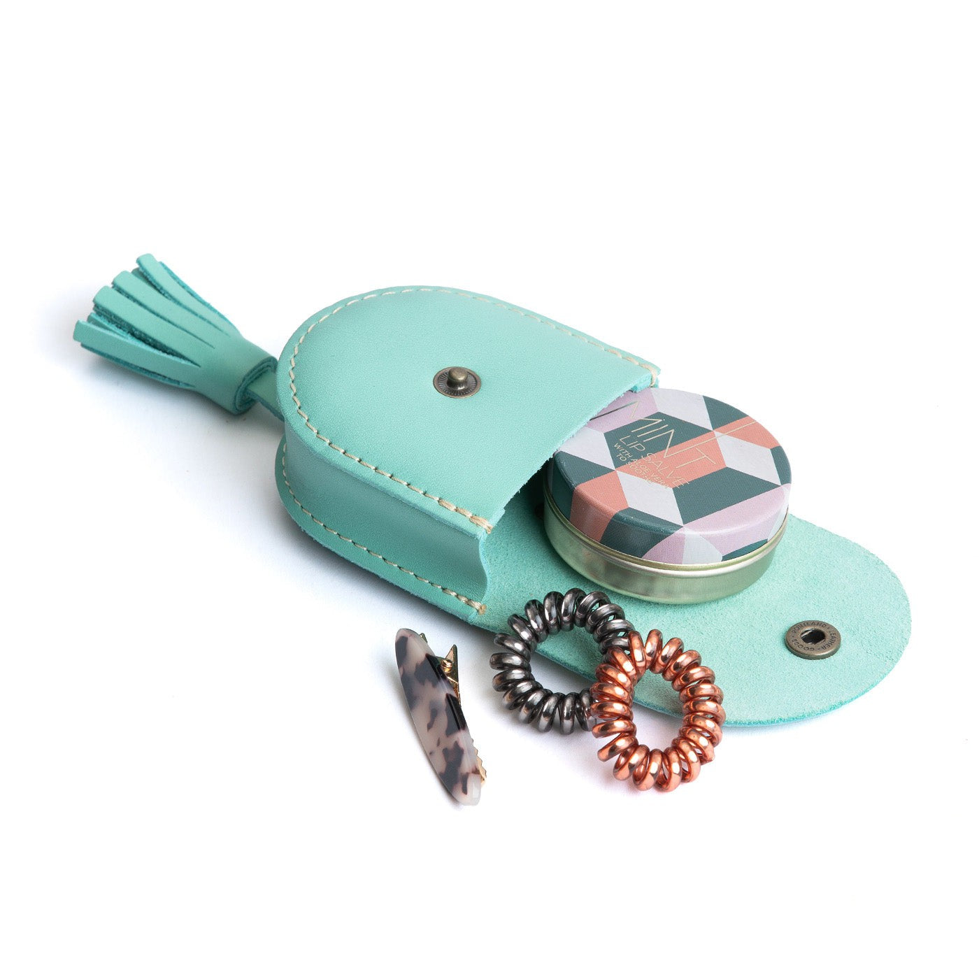 All Color: Mint | U shaped pouch with snap closure, lobster clasp and fringed tassel