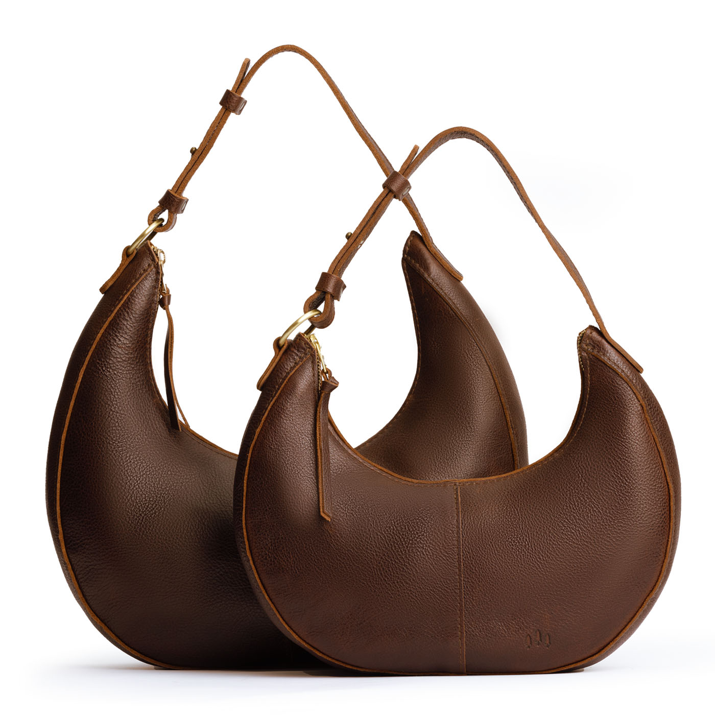 Coldbrew | Crescent shaped shoulder bag with zipper closure and adjustable strap