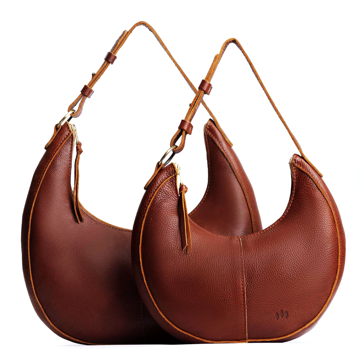 Nutmeg | Crescent shaped shoulder bag with zipper closure and adjustable strap