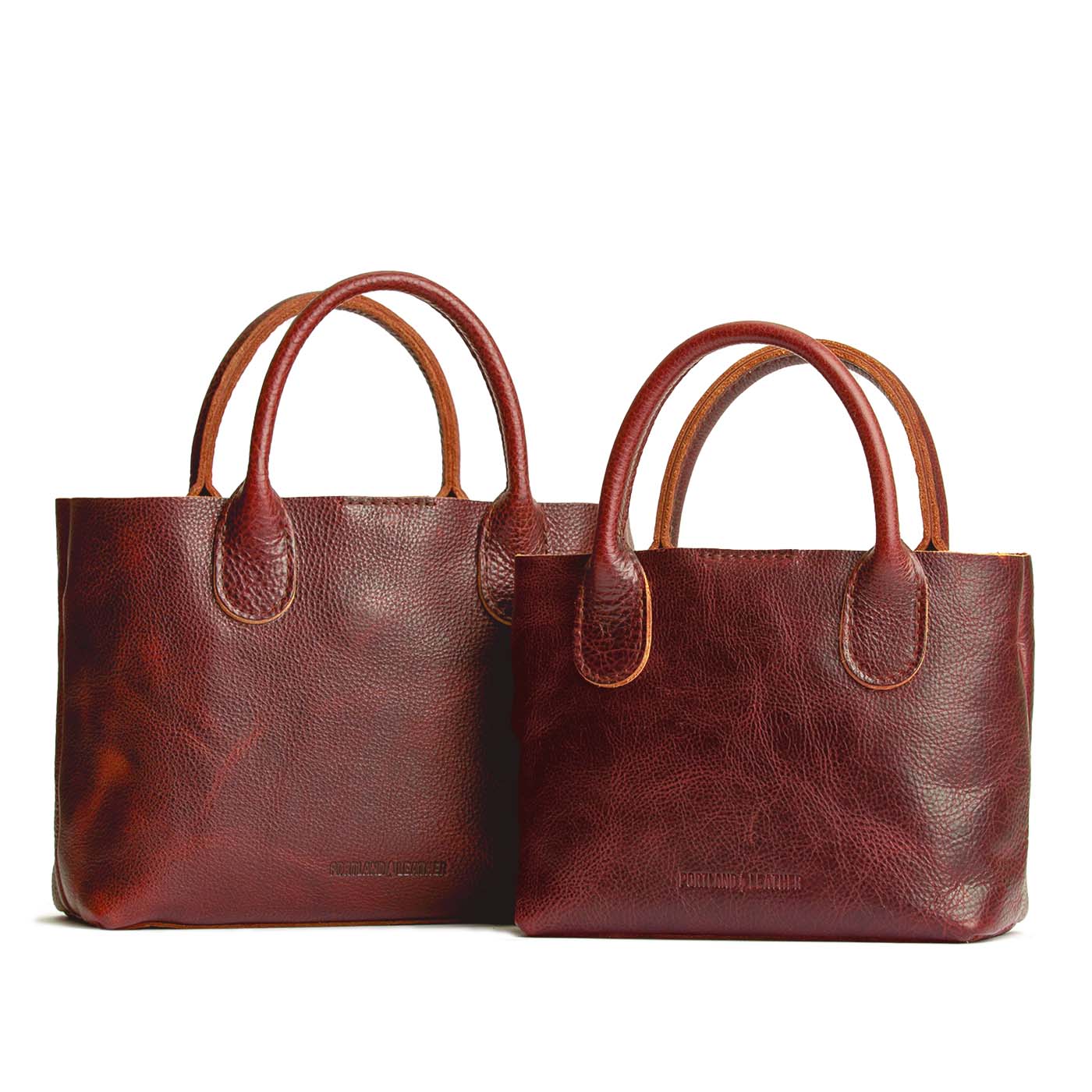 Cinnamon Bear | Side by side of both tote purses with structured leather handles and crossbody strap