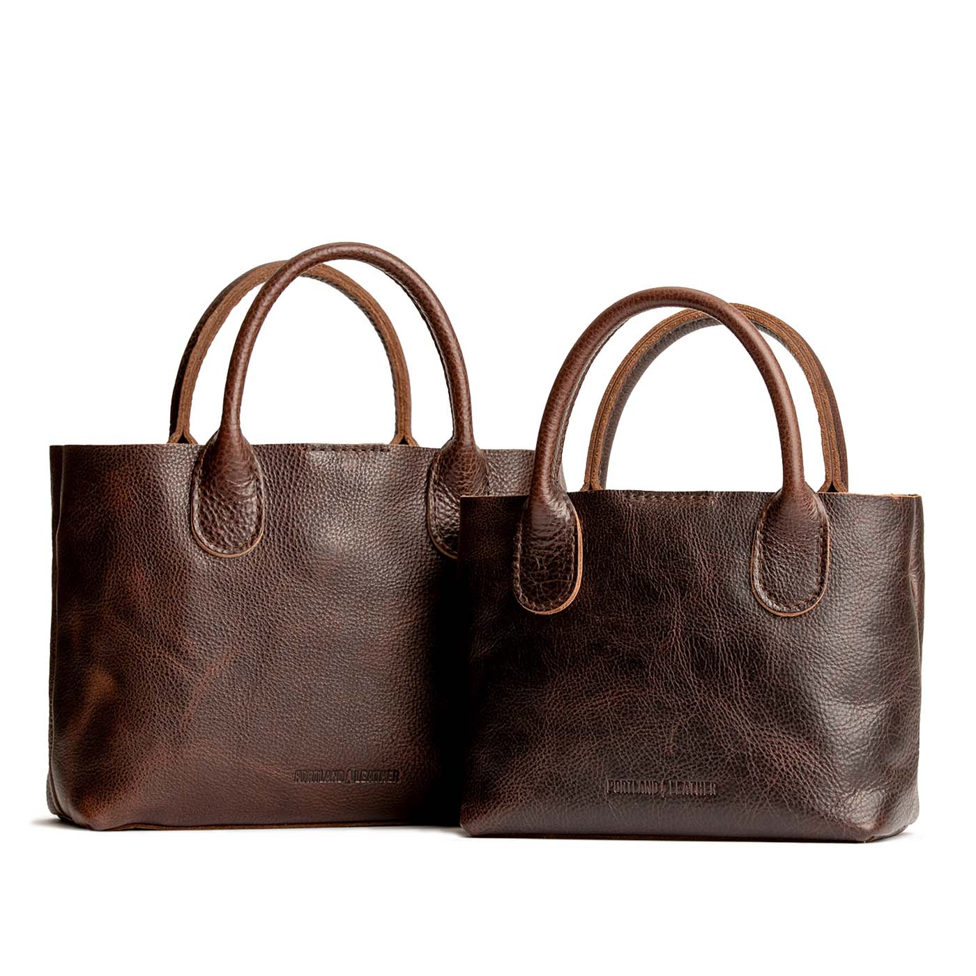 Coldbrew | Side by side of both tote purses with structured leather handles and crossbody strap