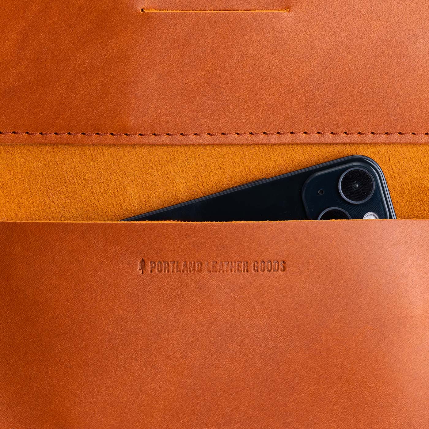 Tuscany | Leather wallet inside pocket with iphone