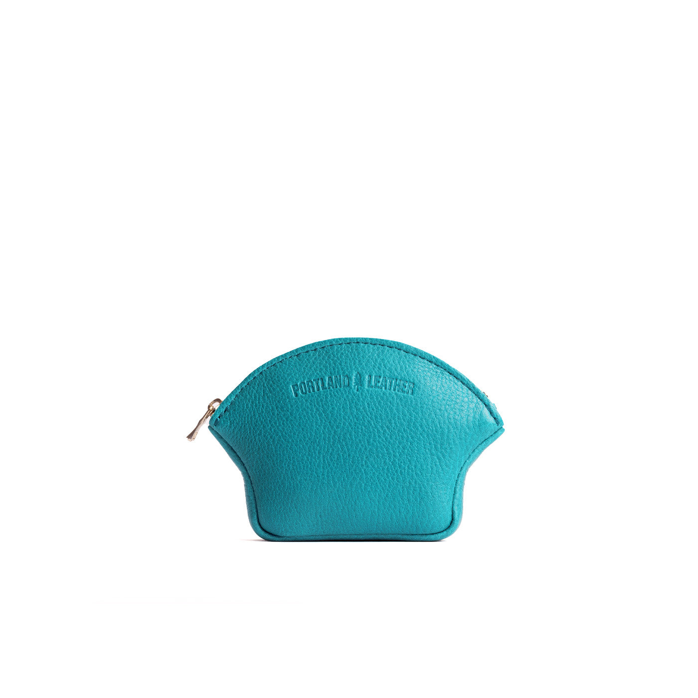 Baja Small | Seashell shaped leather makeup bag with curved top zipper and flat bottom