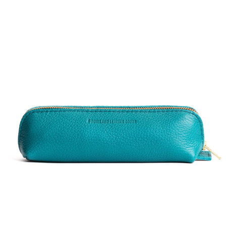 Baja | Leather pouch with curved seams and top zipper